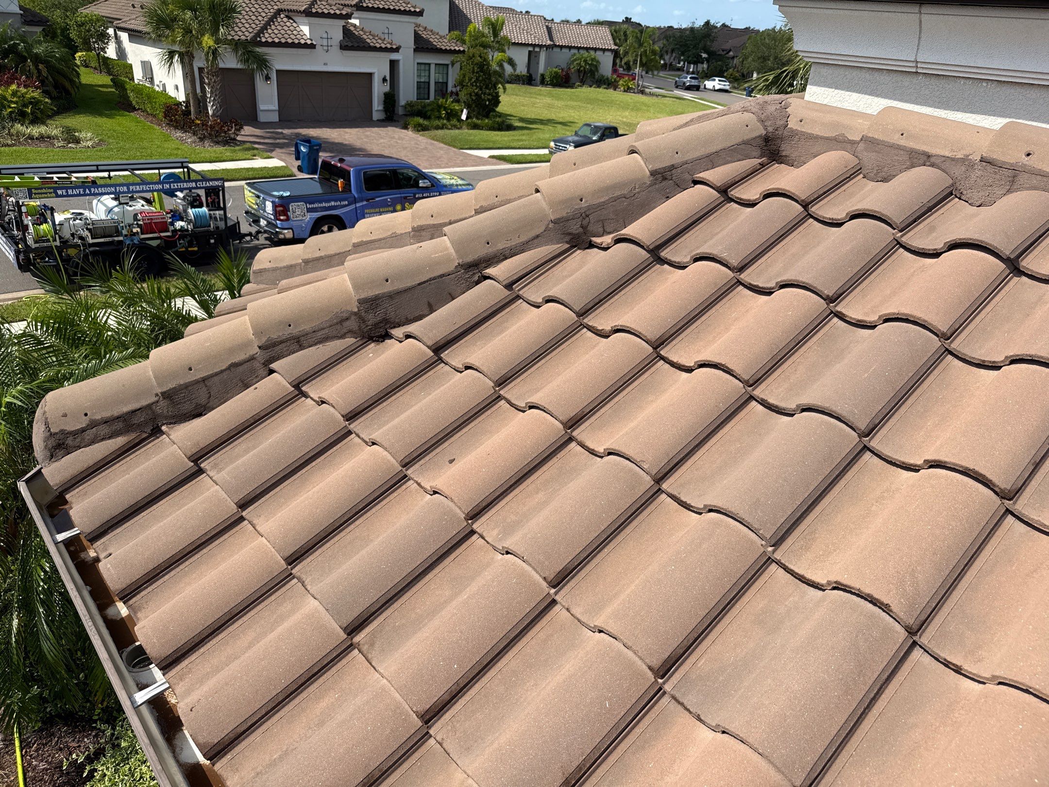 Soft Wash Roof Cleaning – Concrete Tile Roof | Artisan Lakes Esplanade, Palmetto, FL by Sunshine AquaWash