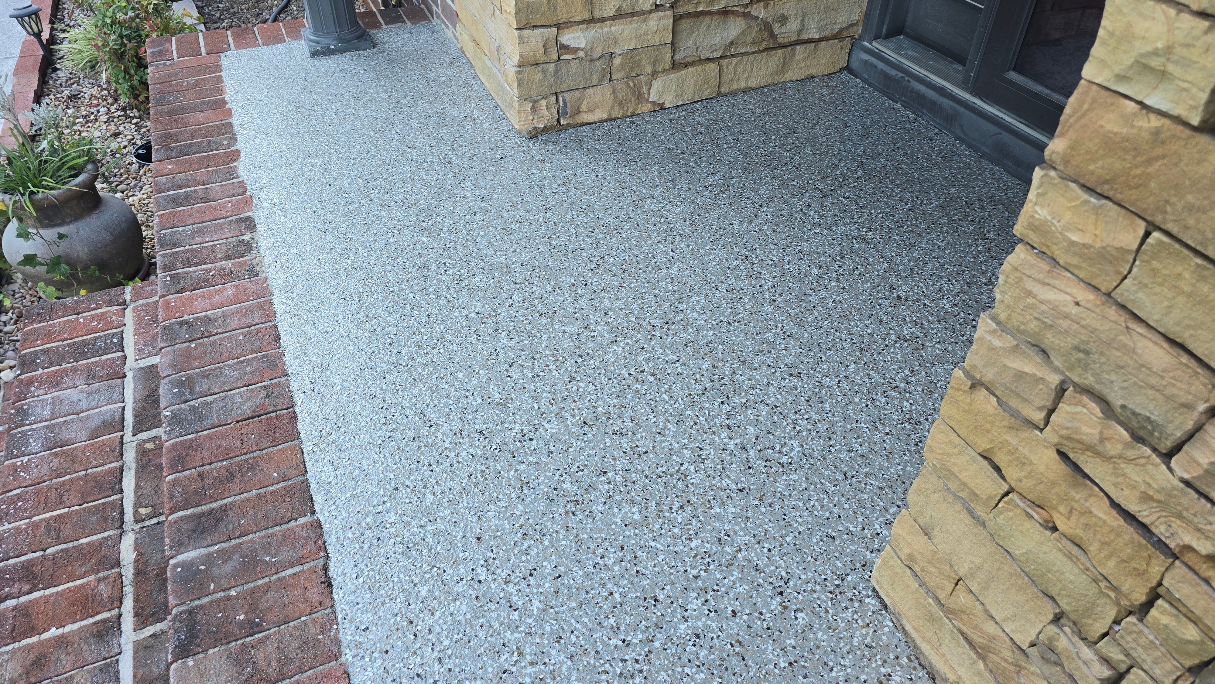 Driveway, Garage, Porch, and Sidewalk using Creekbed by Elite Floor Solutions