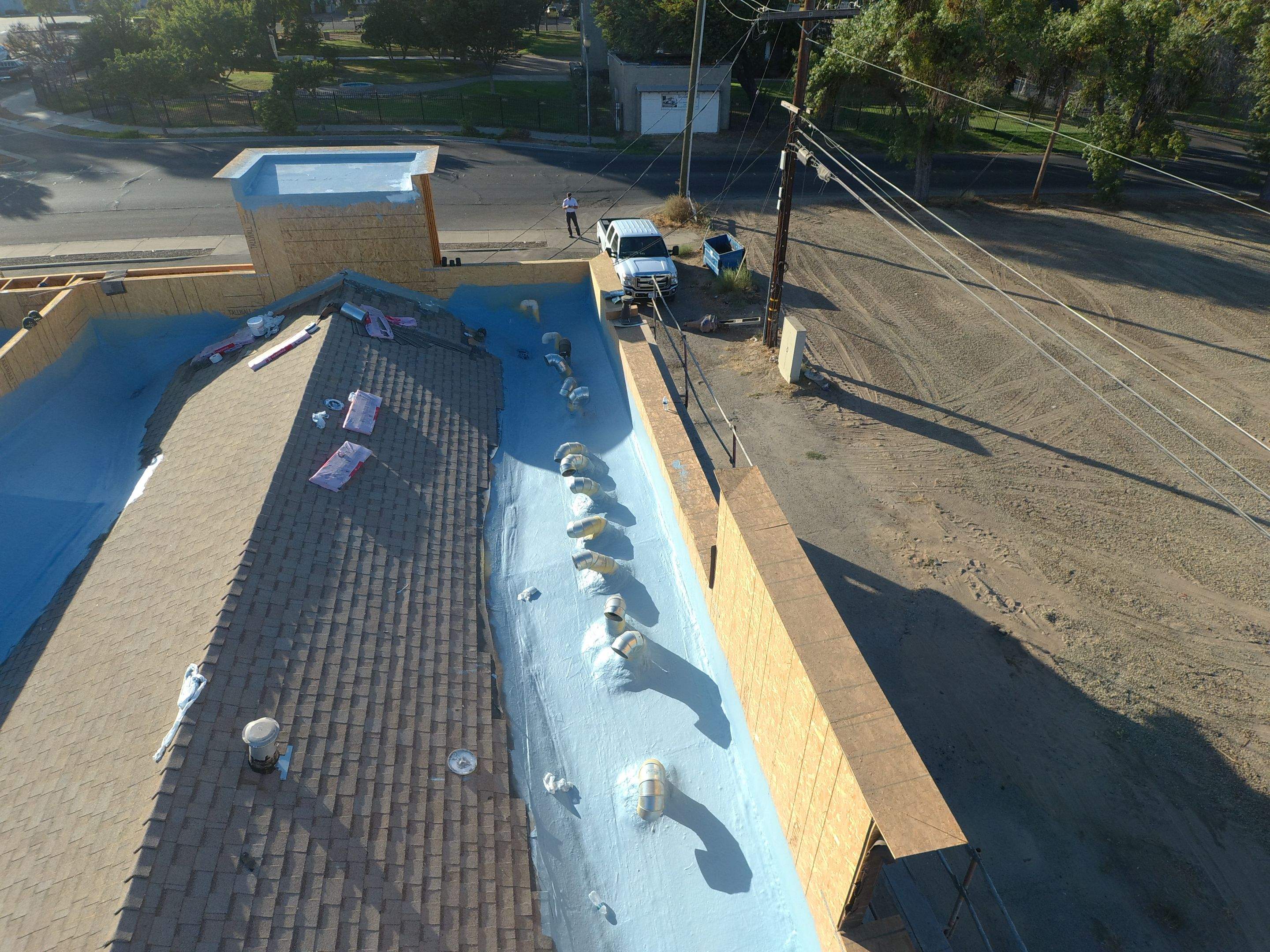 Spray foam and coatings using Conklin Benchmark/PUMA XL coatings and spray foam by Straight Edge Roofing Inc