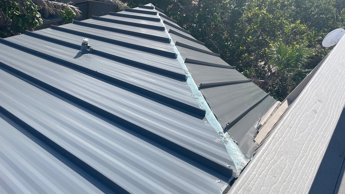 Residential Roofing Installation using Gulf Coast Metals Gulf Seam Panels by Four Peaks Roofing