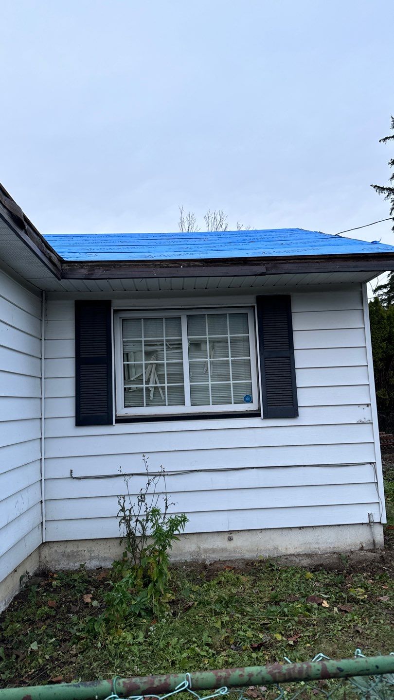 Residential Re-Roof using 12" Prolok metal  by Top Notch Roofing Inc