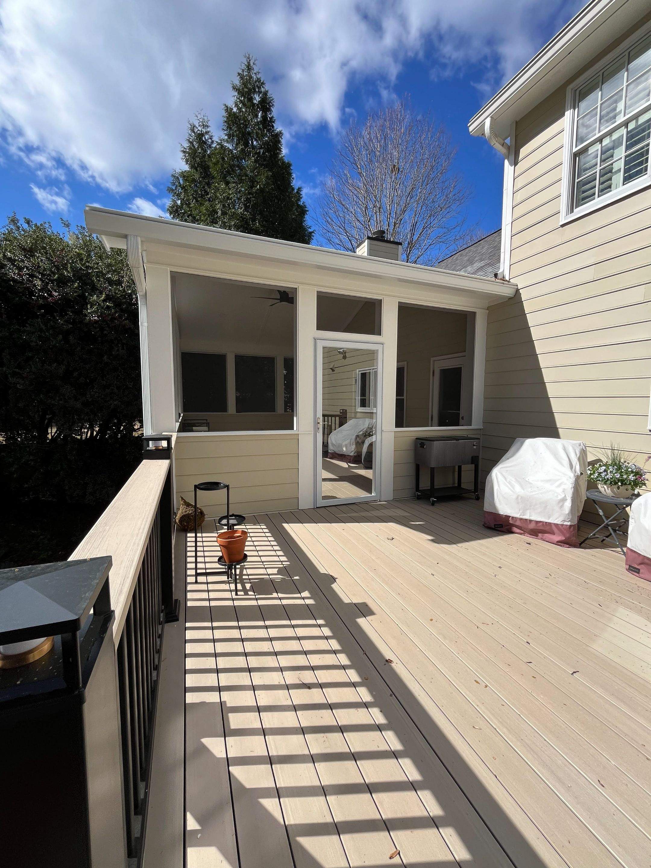 Deck Resurface and Screened-In Porch Build with Timbertech LED Lantern Post Cap Lights by Nelson Exteriors