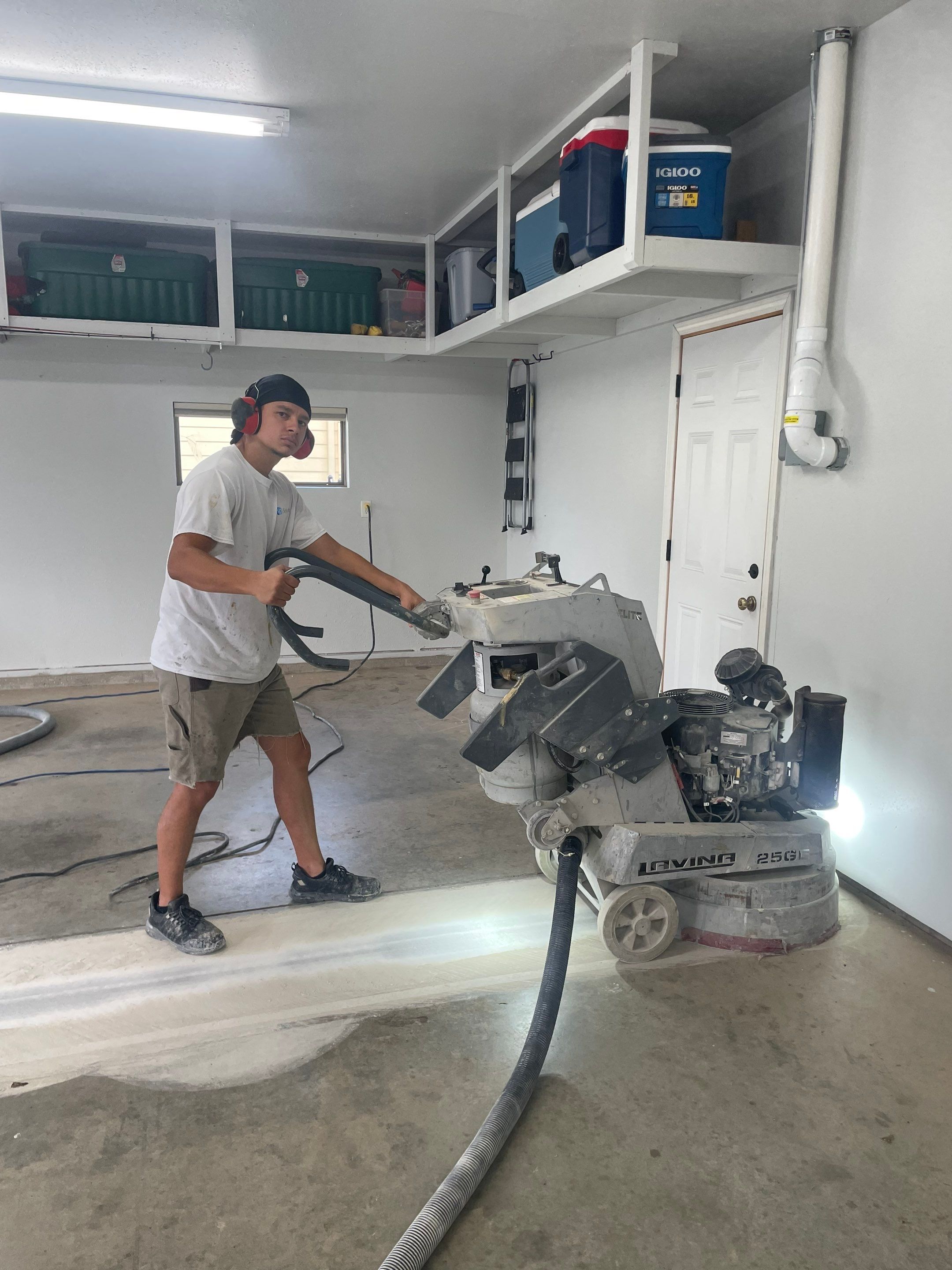 Multi-Car Garage Floor Coating and Crack Repair in Tea by Select Painting, Coatings & Garage Cabinets