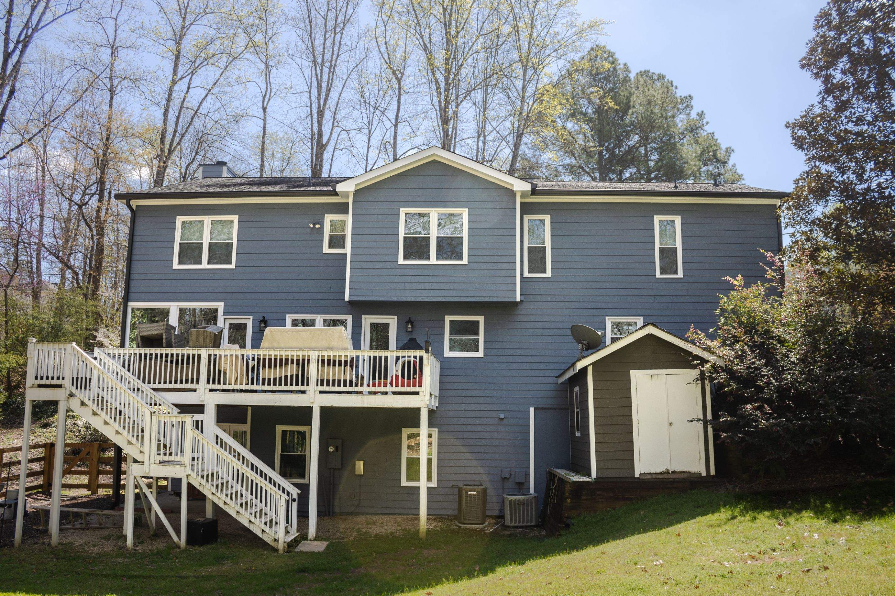 Marietta, GA Full Siding Replacement, 30+ Window Replacements, Screened-In Porch to Sunroom Conversion, Gutter Replacement, and Exterior Painting by Nelson Exteriors