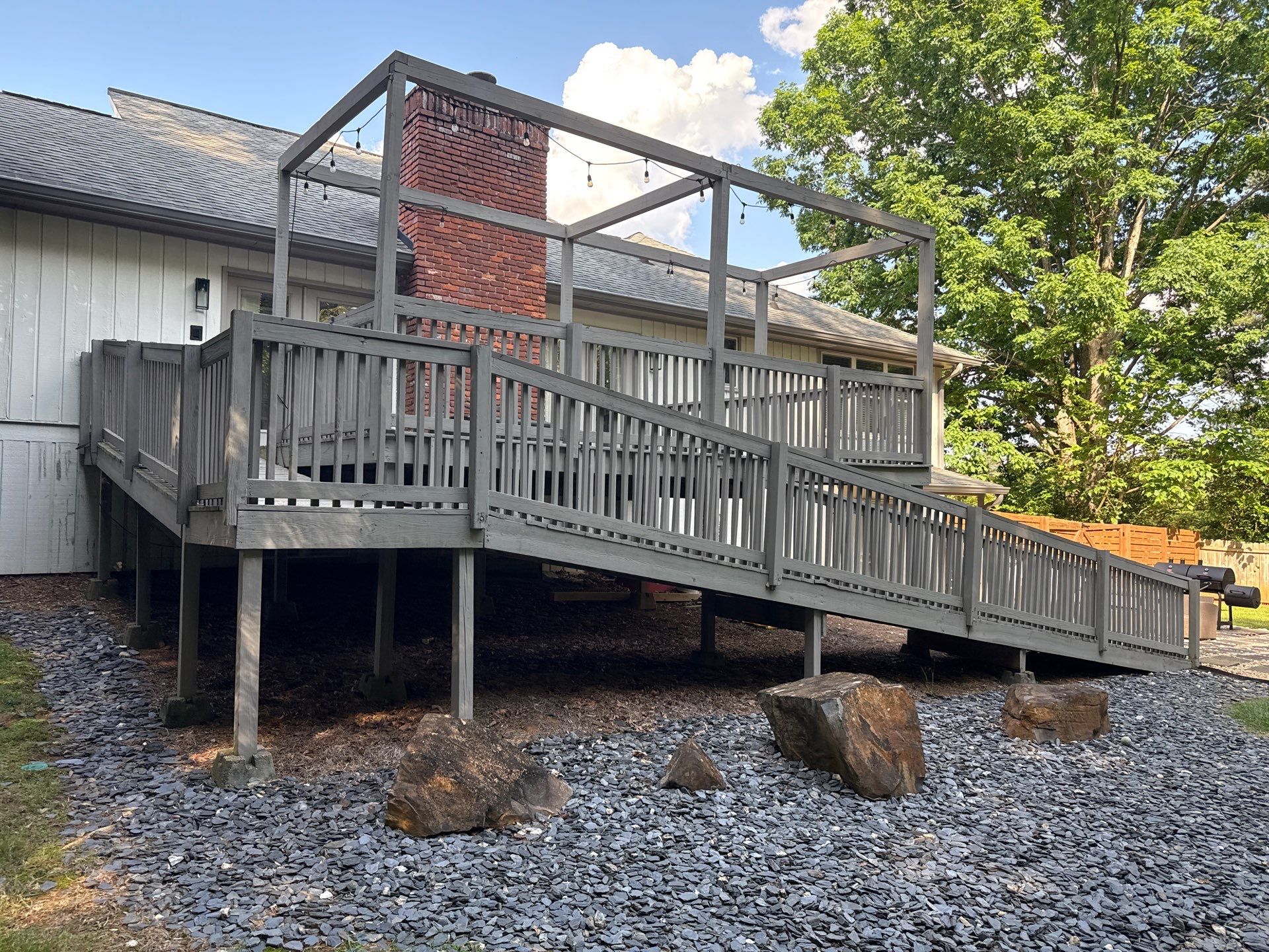 Deck and Shed Roof Style Covered Build using Trex Decking Products by Nelson Exteriors 