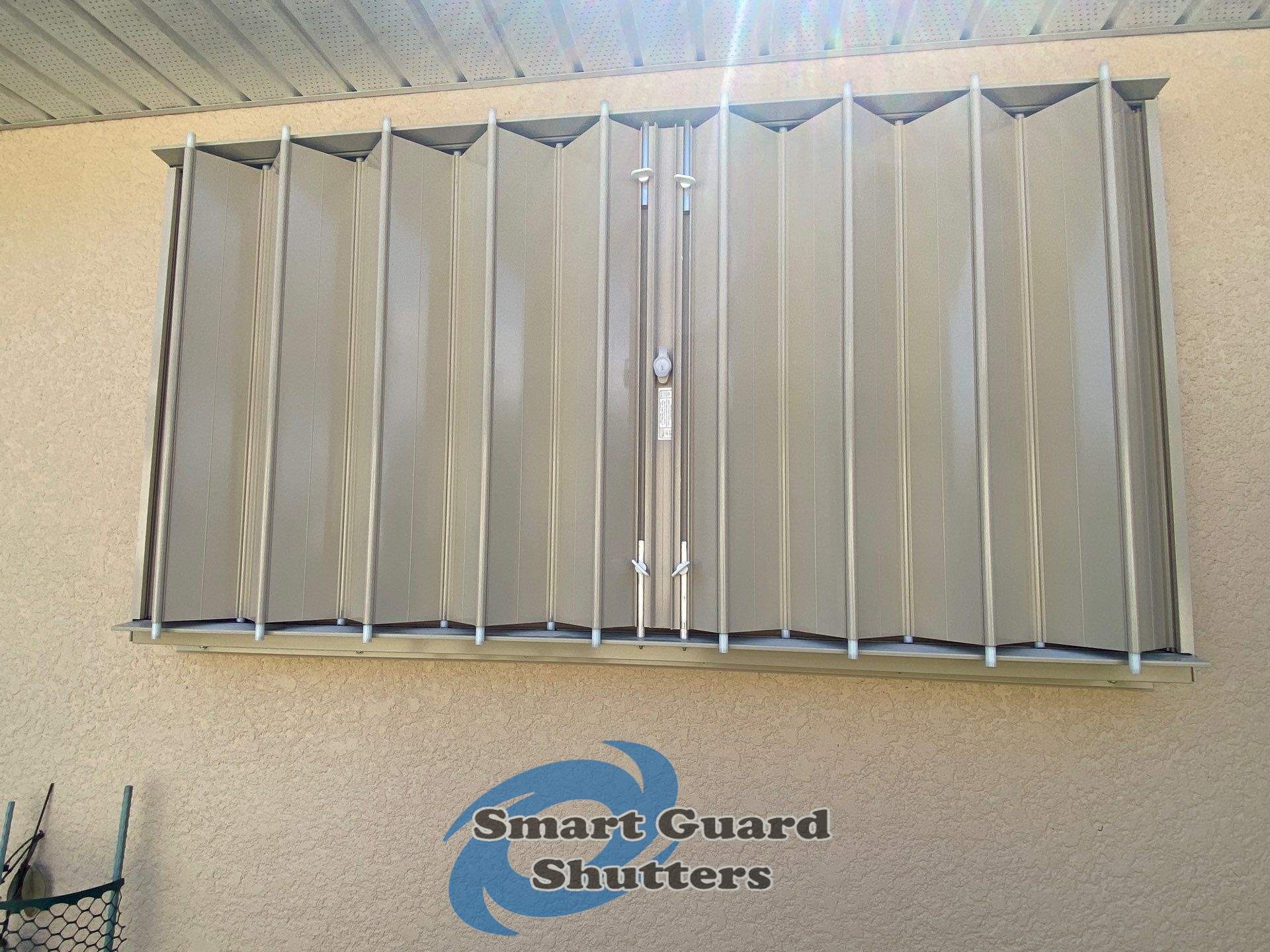Accordions in Beige by Smart Guard Shutters