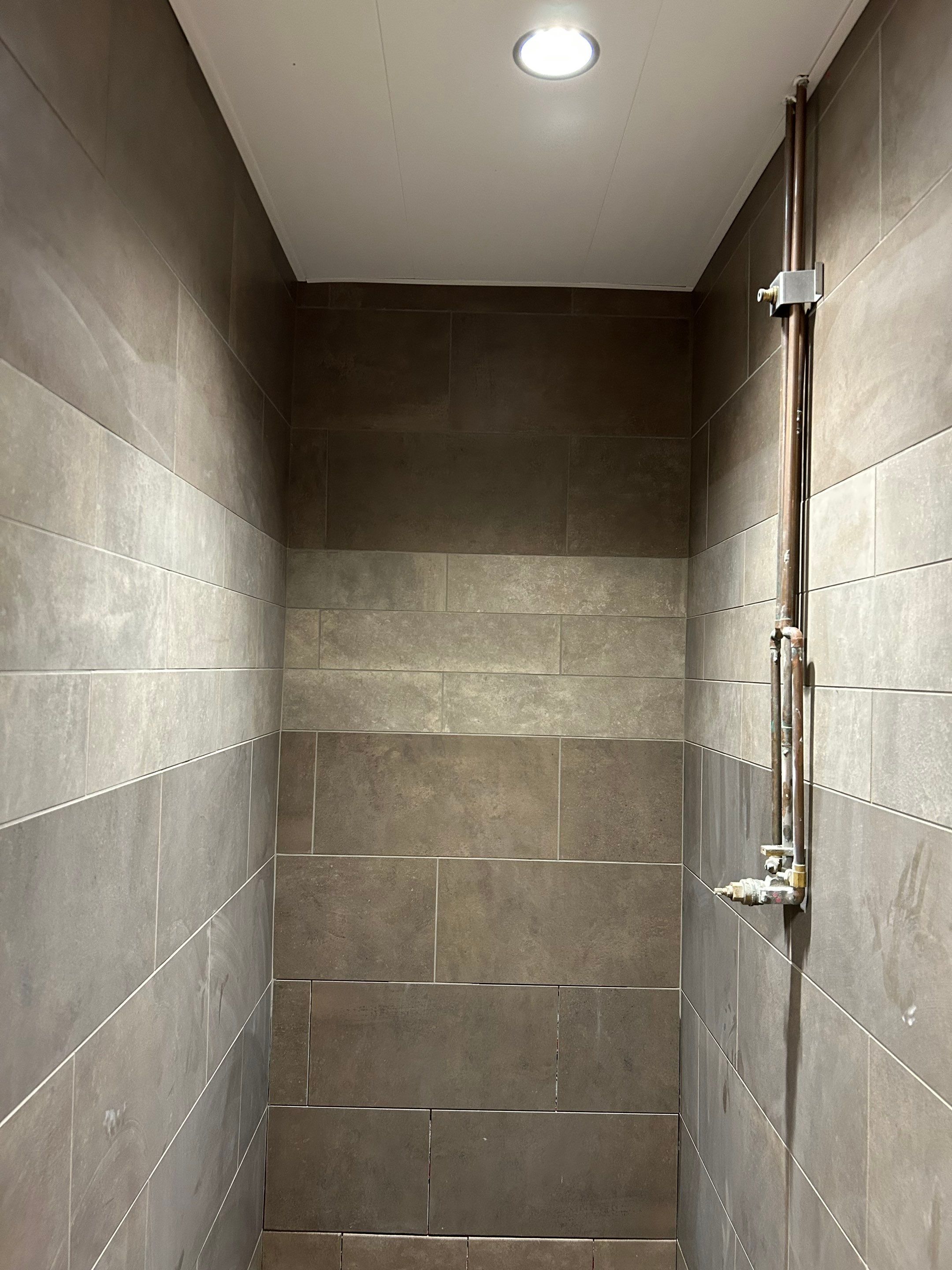 Trucking company showers by Footprints Floors of Nashville