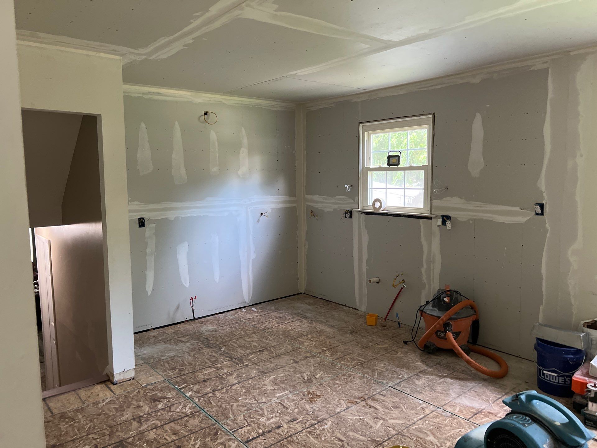 Phoenixville Kitchen Remodel with White Shaker Cabinets and Green Backsplash by Reliable General Contracting