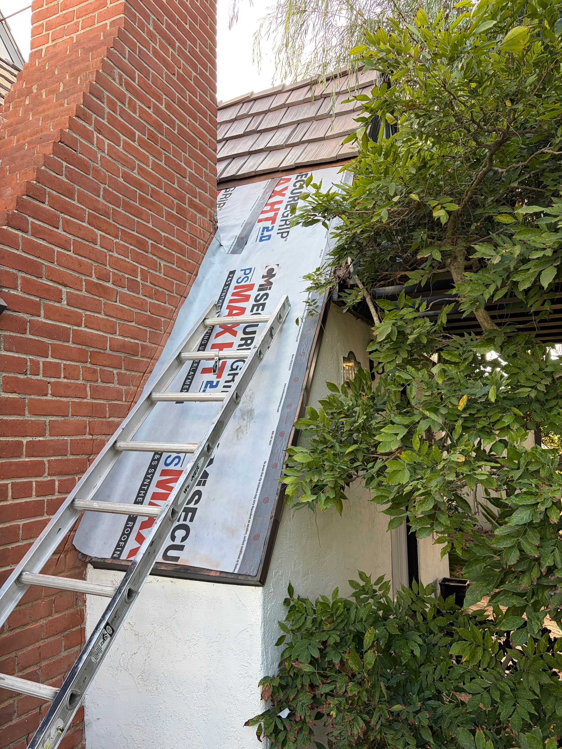 Composite Shake Roofing and Custom Chimney Cricket Installation in San Diego by Westmark Roofing