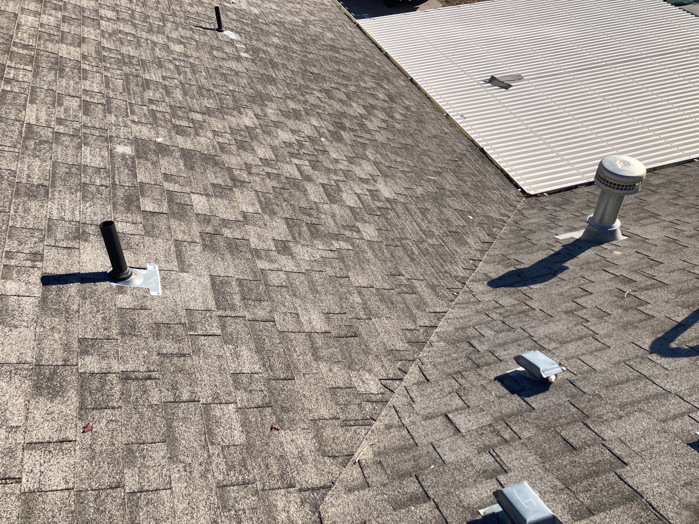 Two story farmhouse style roofing installation using Owens Corning Duration in the color Teak by ID Roofing LLC