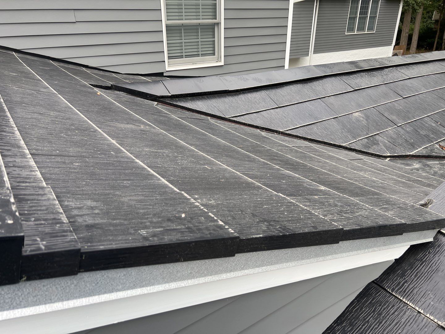 Tesla Solar Roof Replacement using Tesla Solar Roof V3 Tiles by American Home Contractors