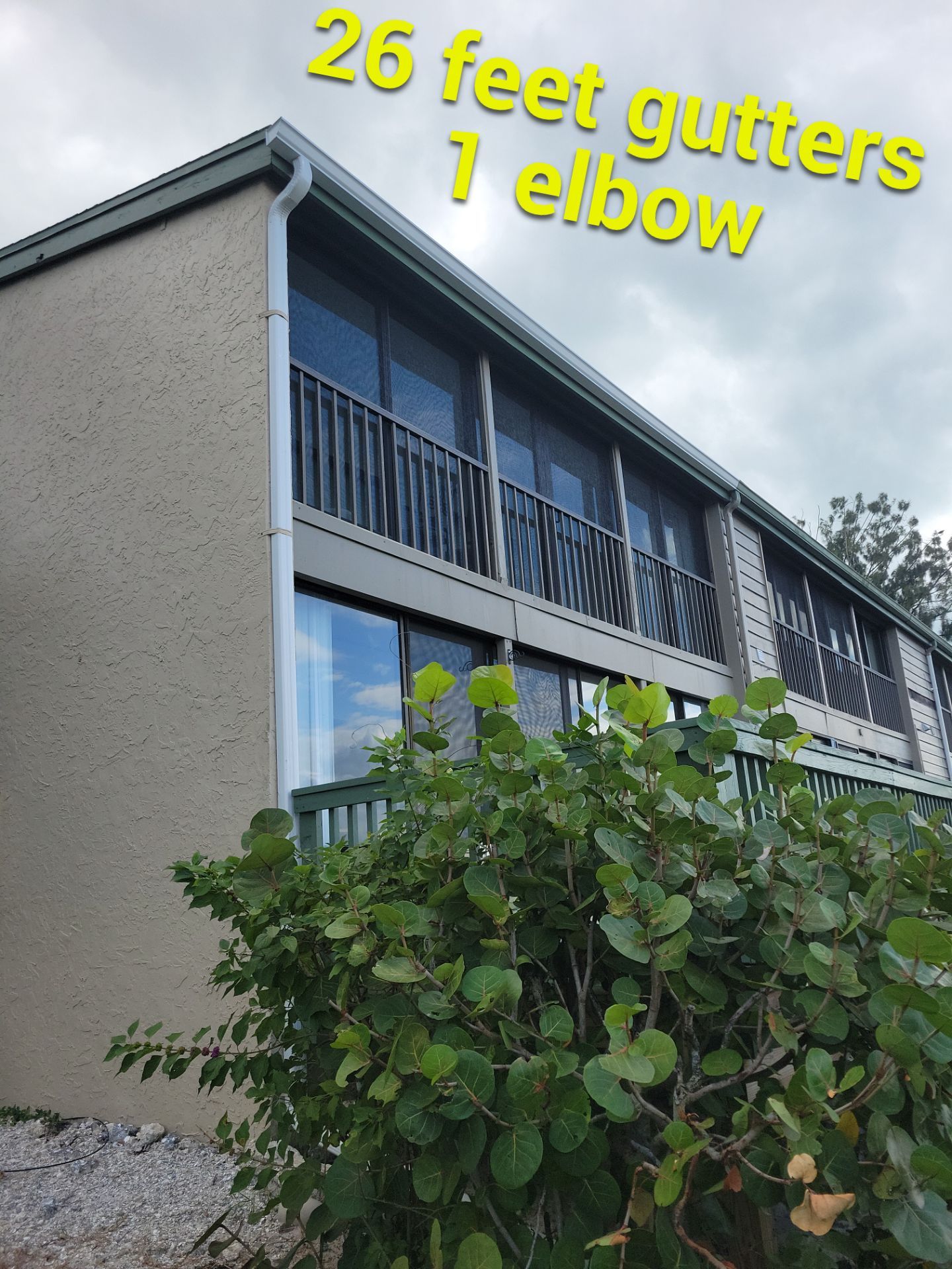 White Gutters Repair and Installation in Sarasota FL by Gutter Professors