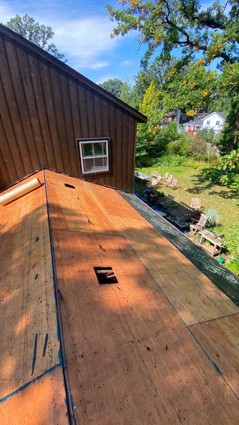 Asphalt Roof Replacement with Half Round Copper Gutter Installment  by Custom Installations