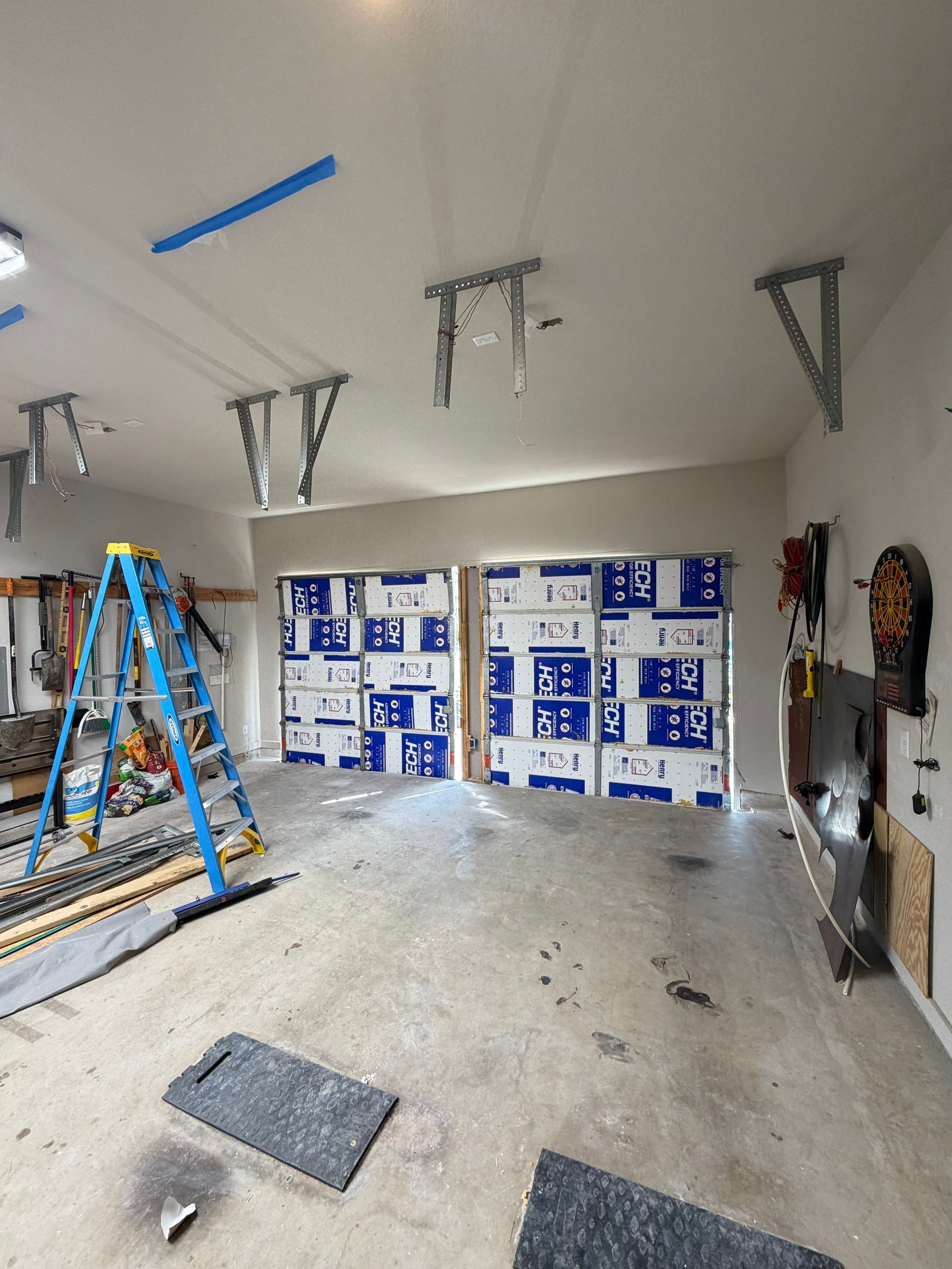 Garage Door Center Post Conversion in Aubrey, Texas by Meadows Garage Doors