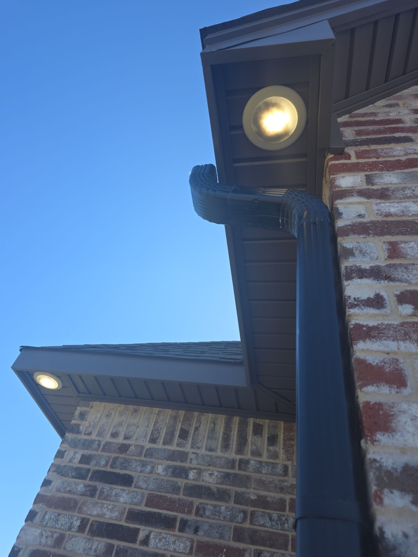 Fascia and door frames wrapped with PVC coil & soffit installation by In & Out Construction & Remodeling, LLC