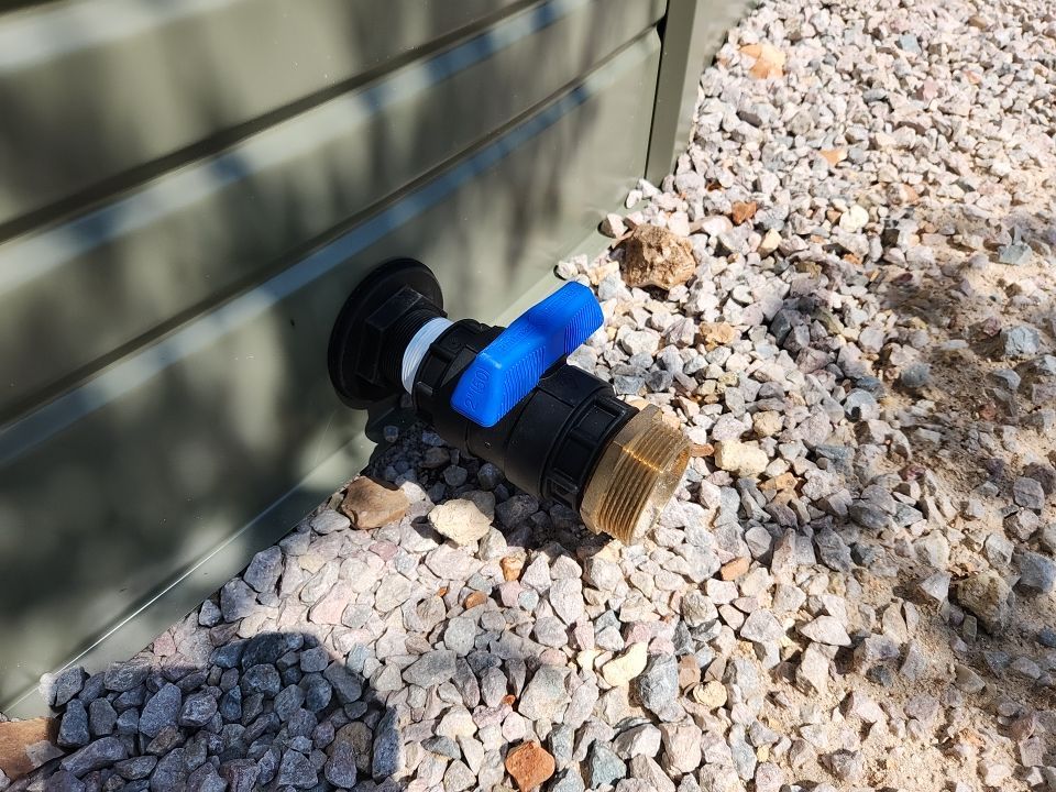 Residential Rainwater Collection System - Pioneer 40K gallon water tank in Mangrove Green by Hill Country Rain Water