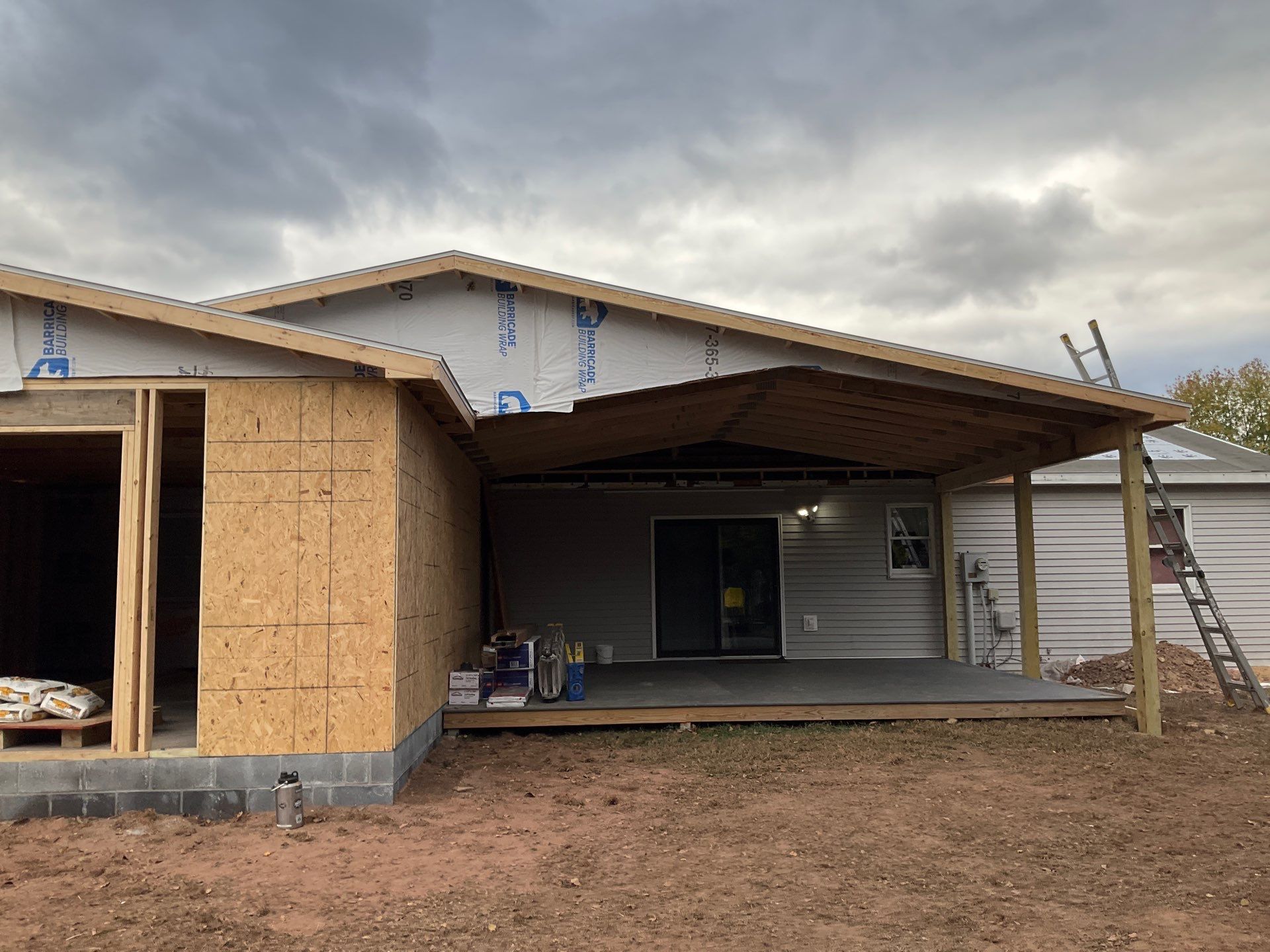 Residential Addition and Covered Porch Roof  by Esh Builders