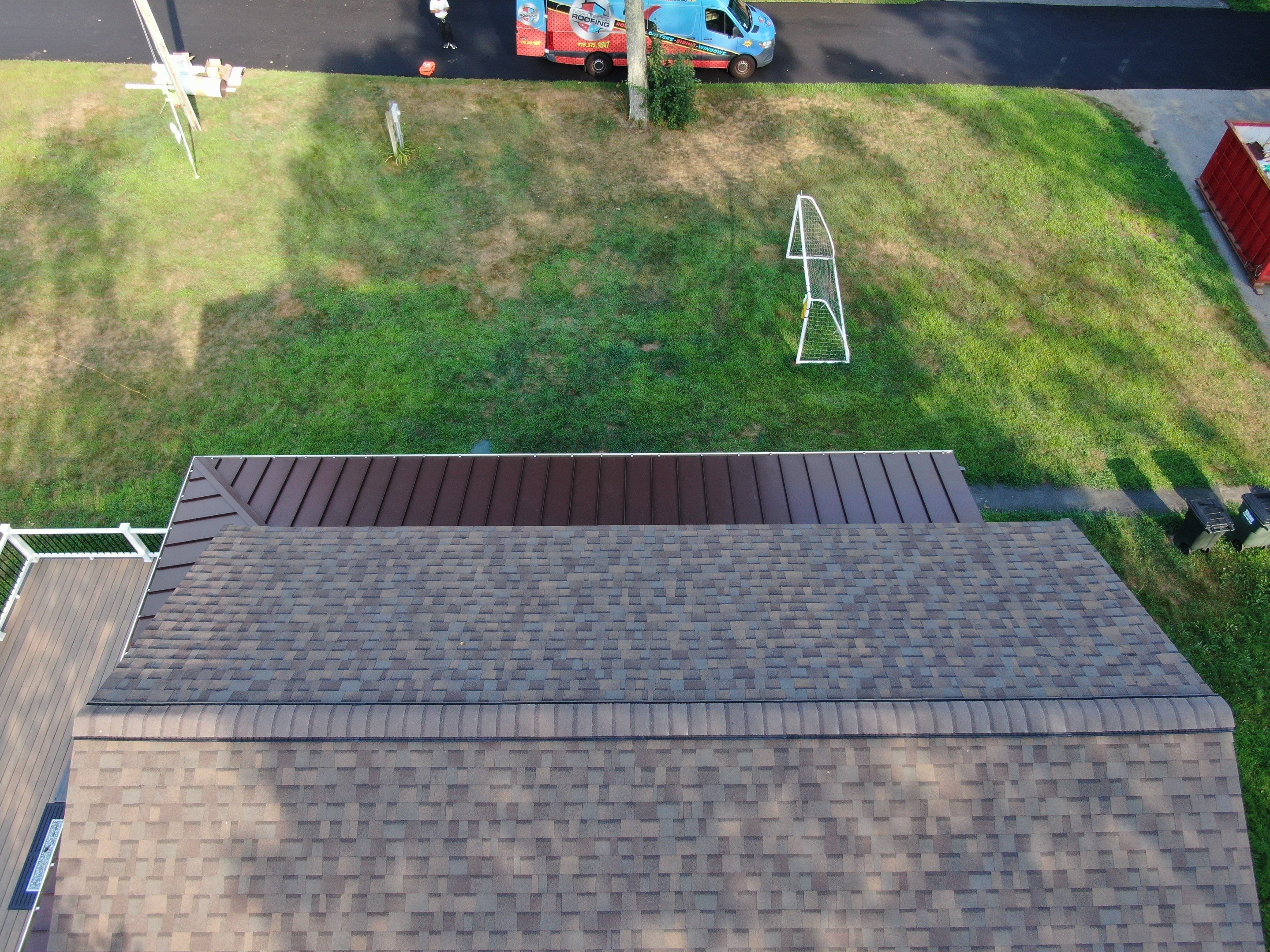 Full Roof Replacement & Farmers Porch Restoration – Asphalt + Standing Seam Metal by Mighty Dog Roofing of Greater Middlesex County
