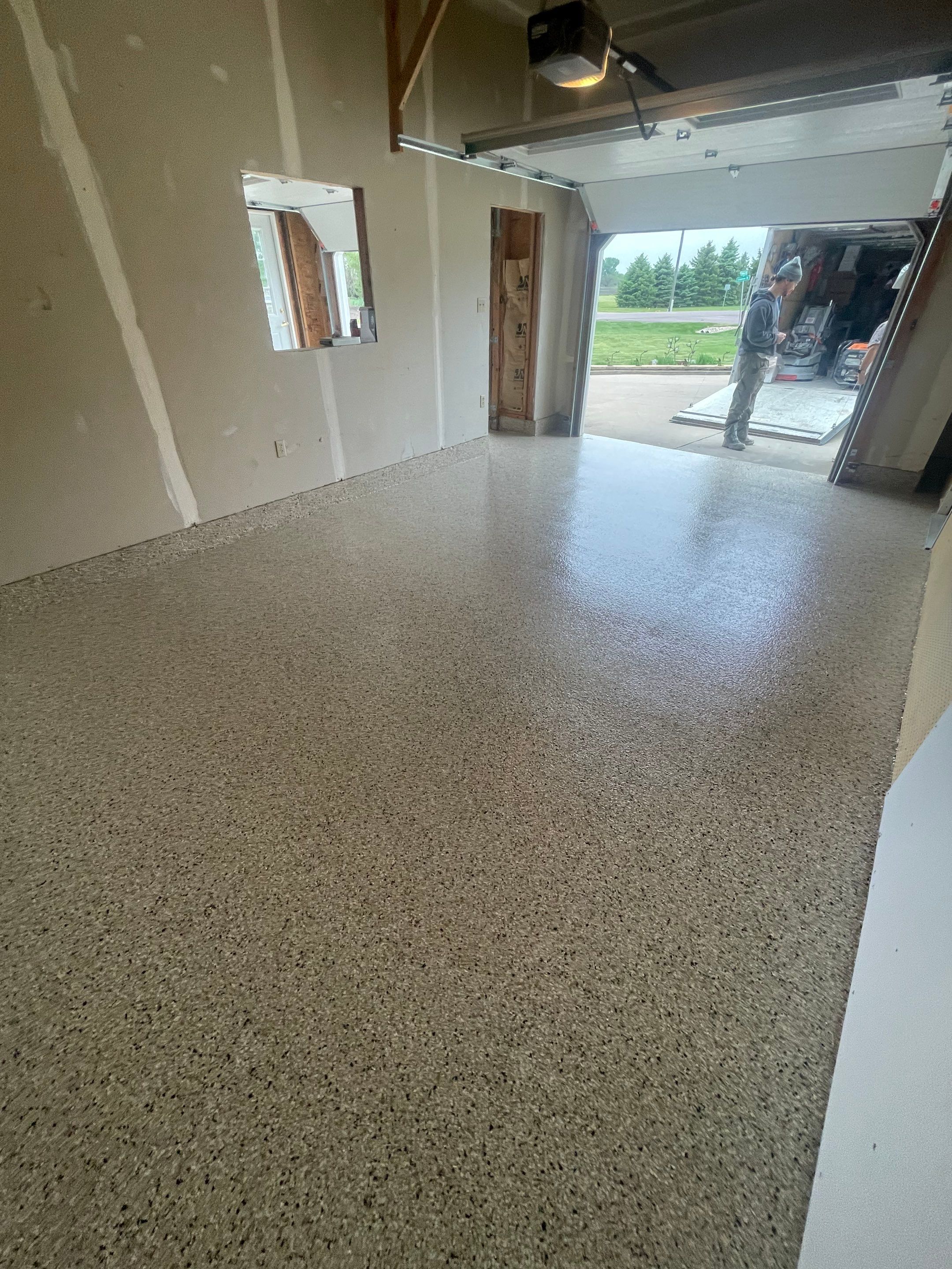 Speckled Epoxy Floor Coating Installation for Centerville Residential Garage by Select Painting, Coatings & Garage Cabinets