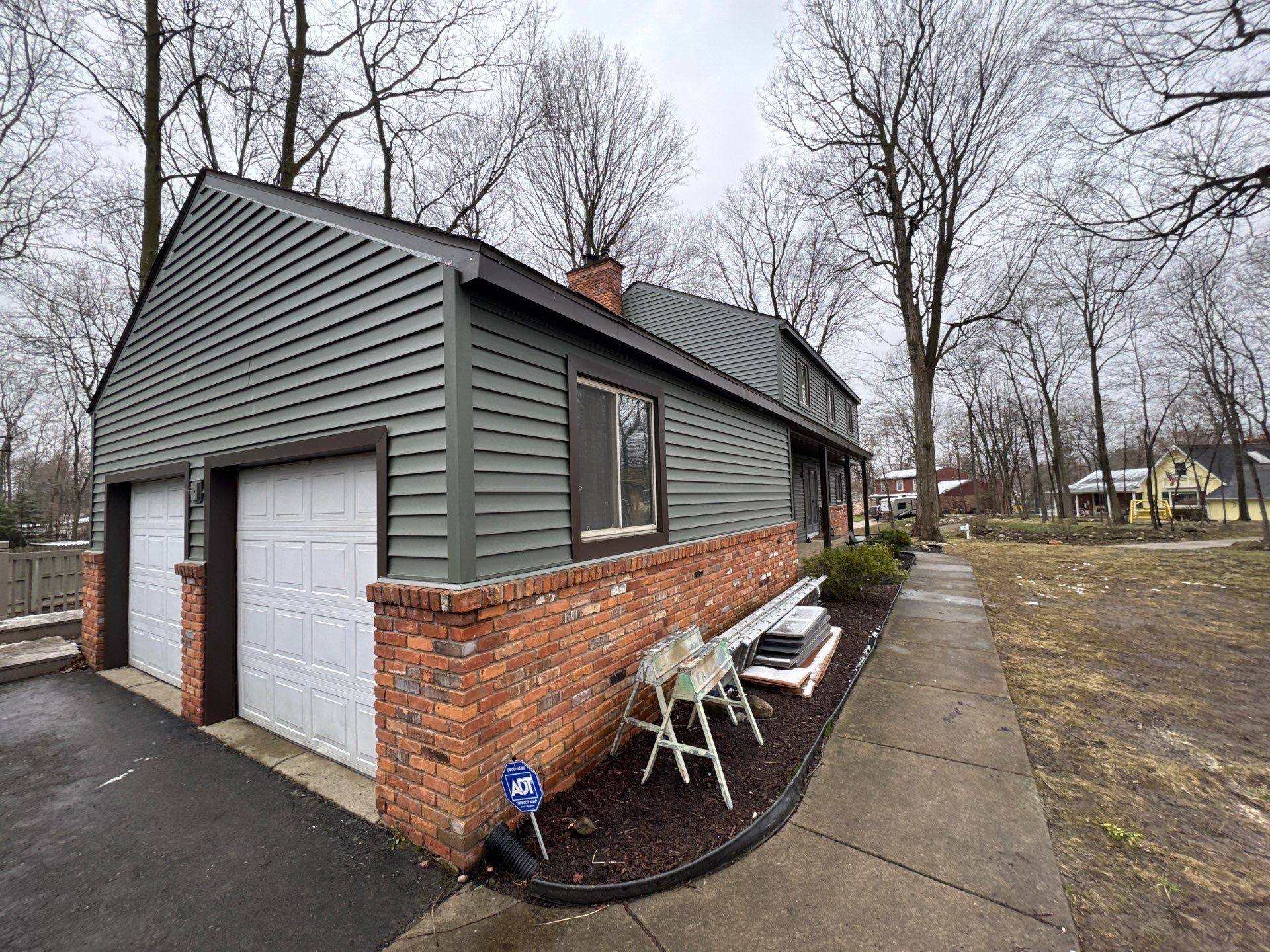 Siding Replacement using Alside Charter Oak D4.5" Deep Moss by 180 Contractors