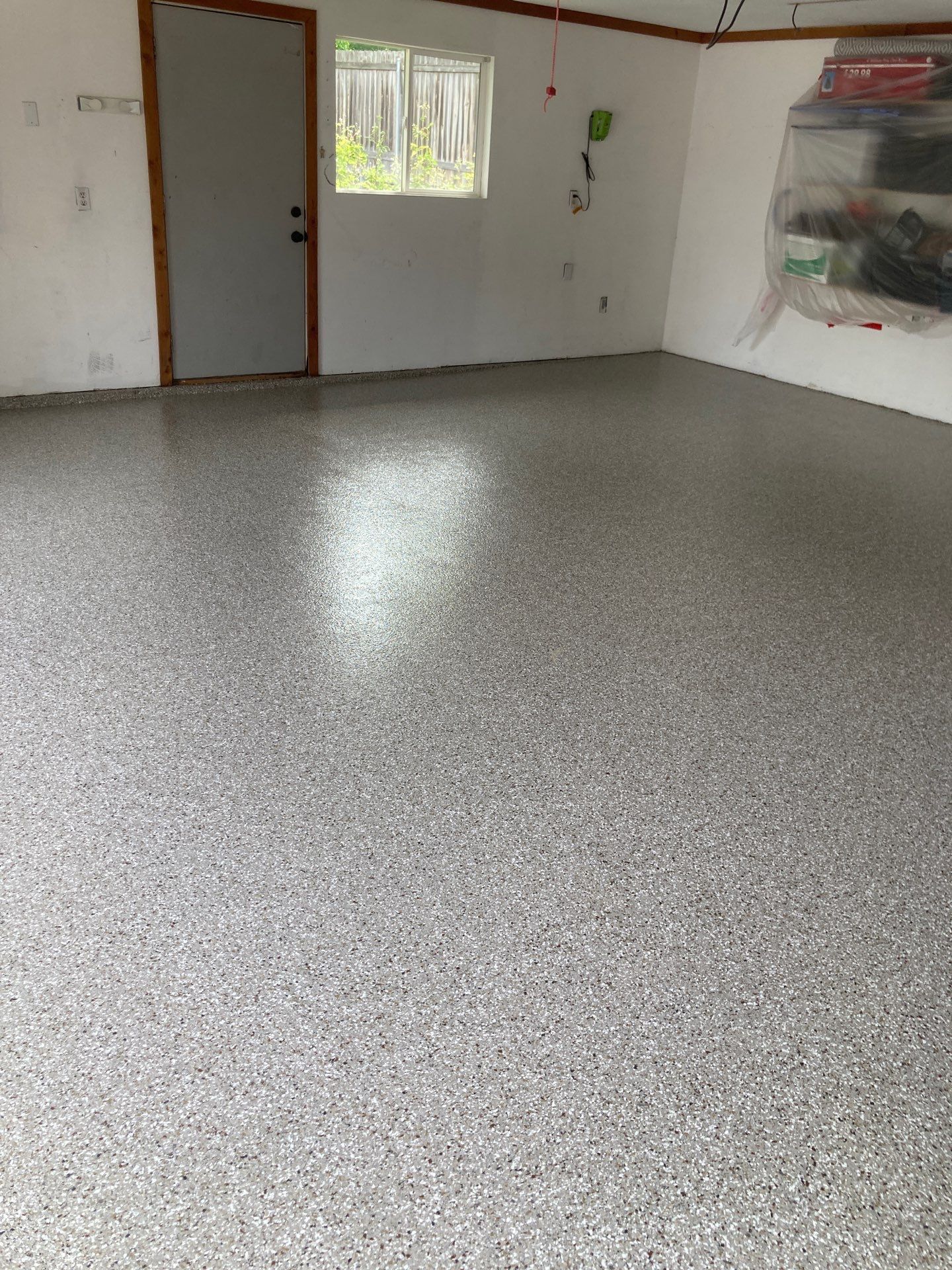 Garage Transformation using Pebble Beach by Croc Coatings, LLC