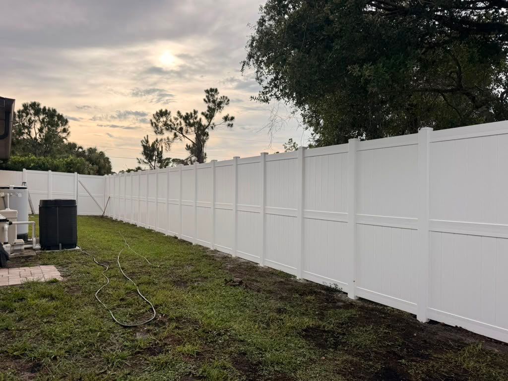 8'H White Vinyl Privacy Fence Installation in North Port by True Fence LLC