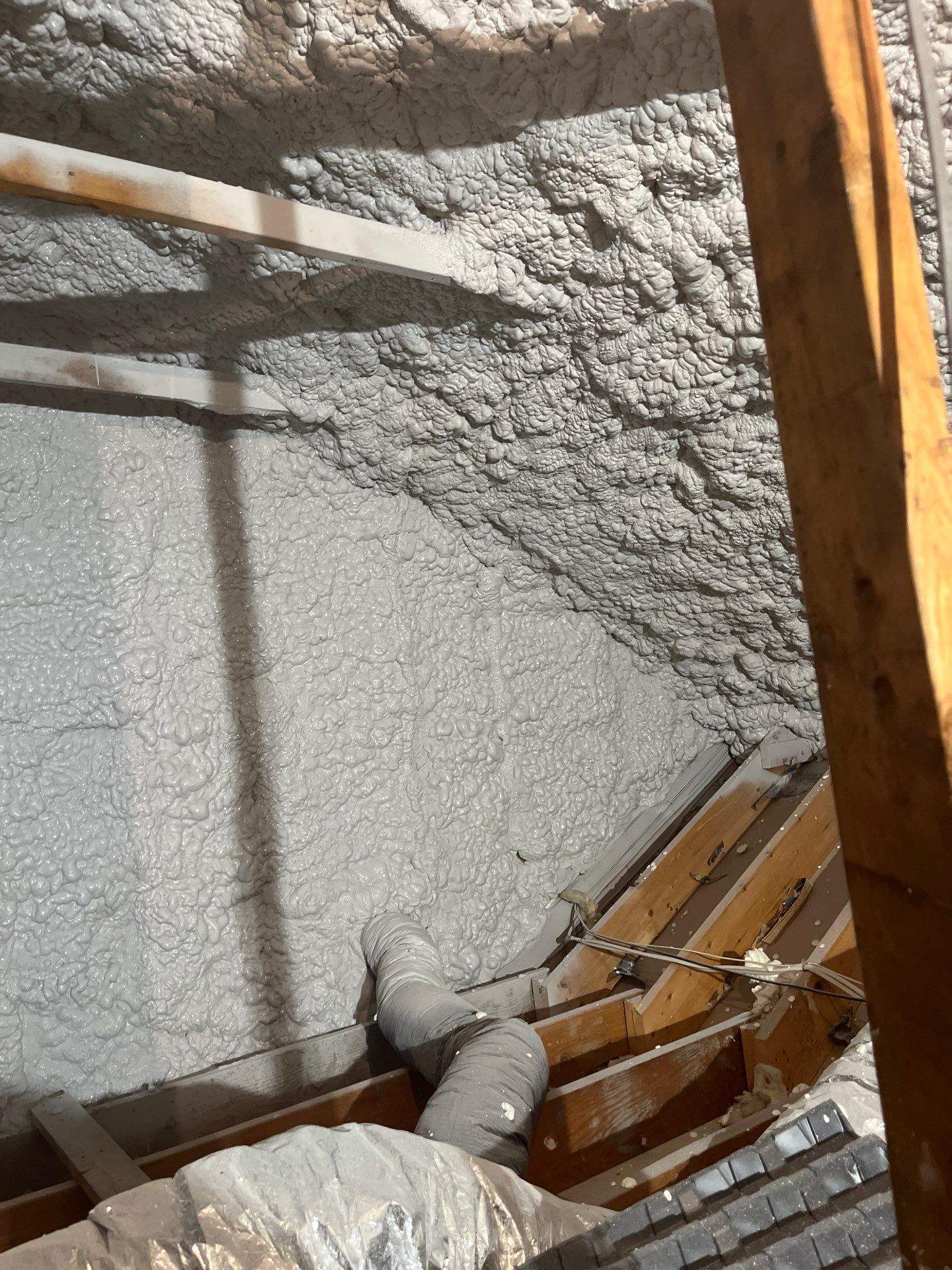 Attic Insulation using open cell spray foam by NYS Foam & Energy