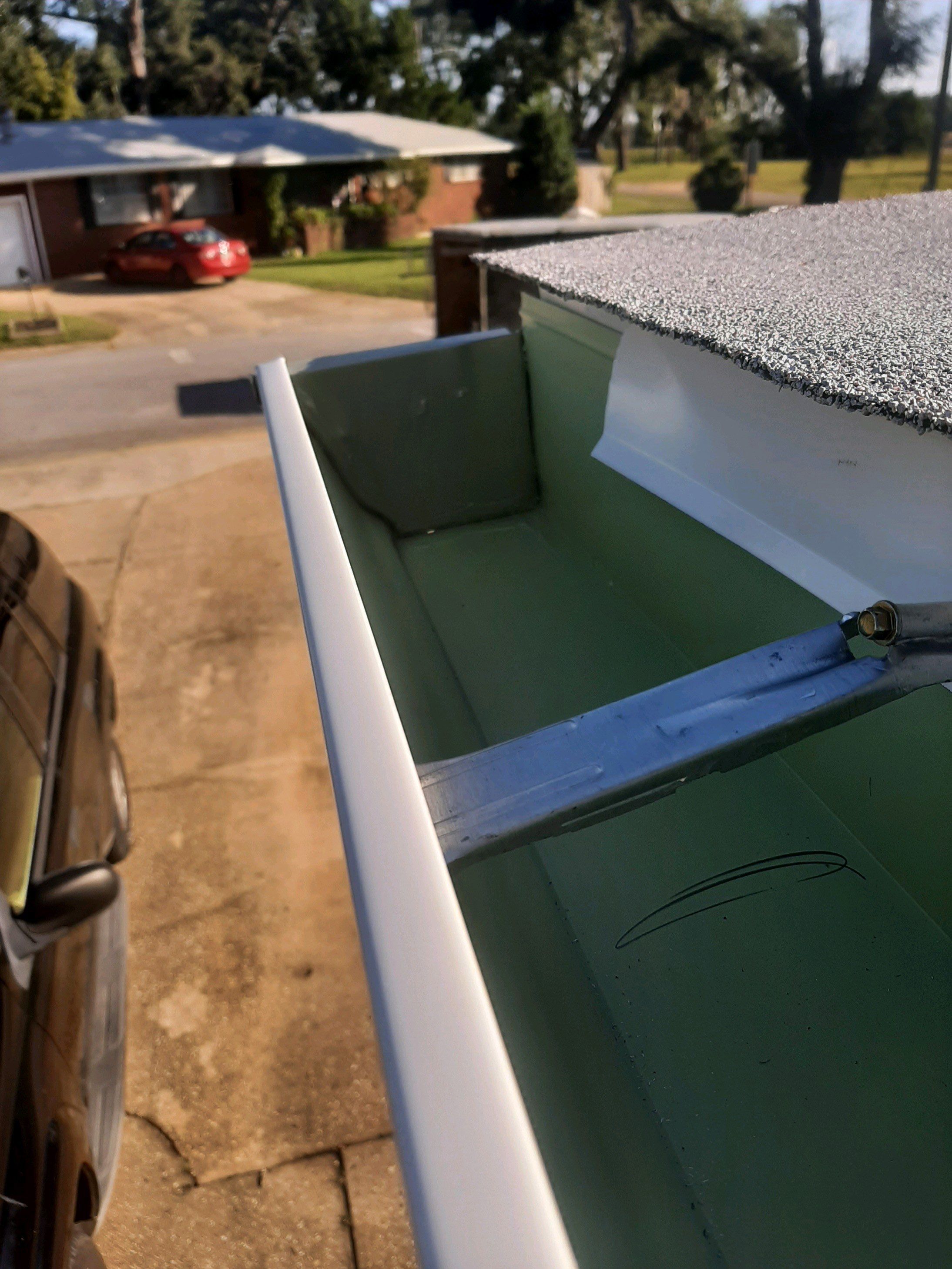 Gutter Installation using K-Style Seamless Gutters and Gutter Leaf Guards by Gutter Professors
