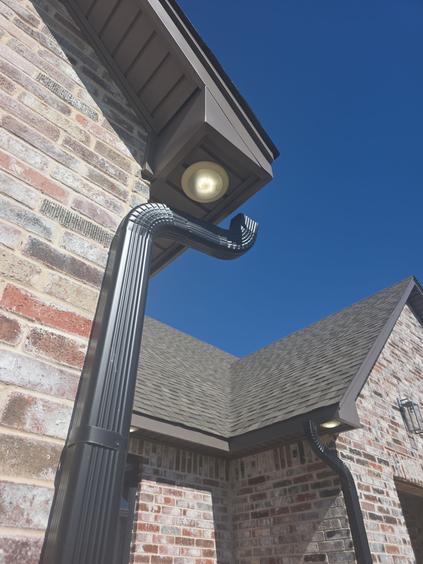 Fascia and door frames wrapped with PVC coil & soffit installation by In & Out Construction & Remodeling, LLC