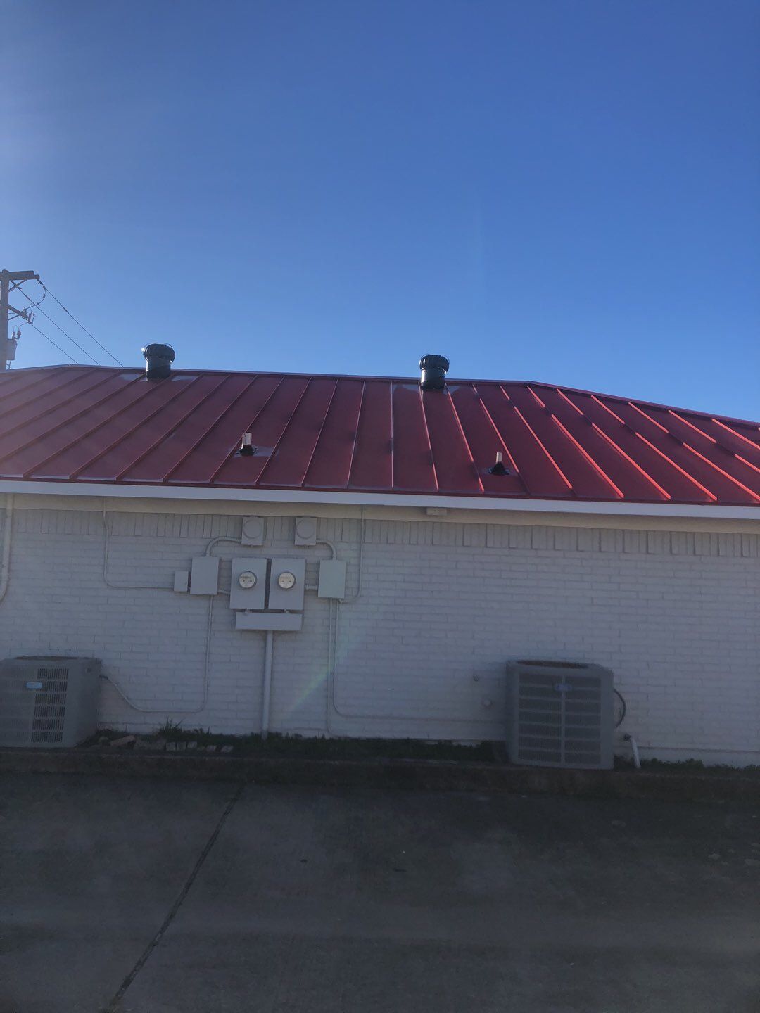 Commercial metal roof by Springtree Restoration 