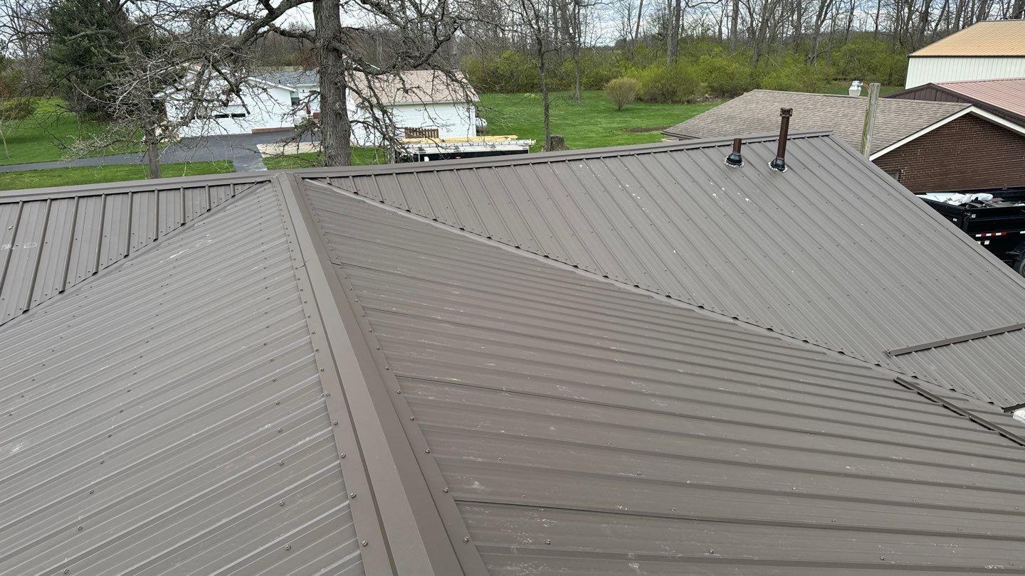 Residential Roofing Installation using Performance Panel Metal - Crinkle Bronze by RoofX 