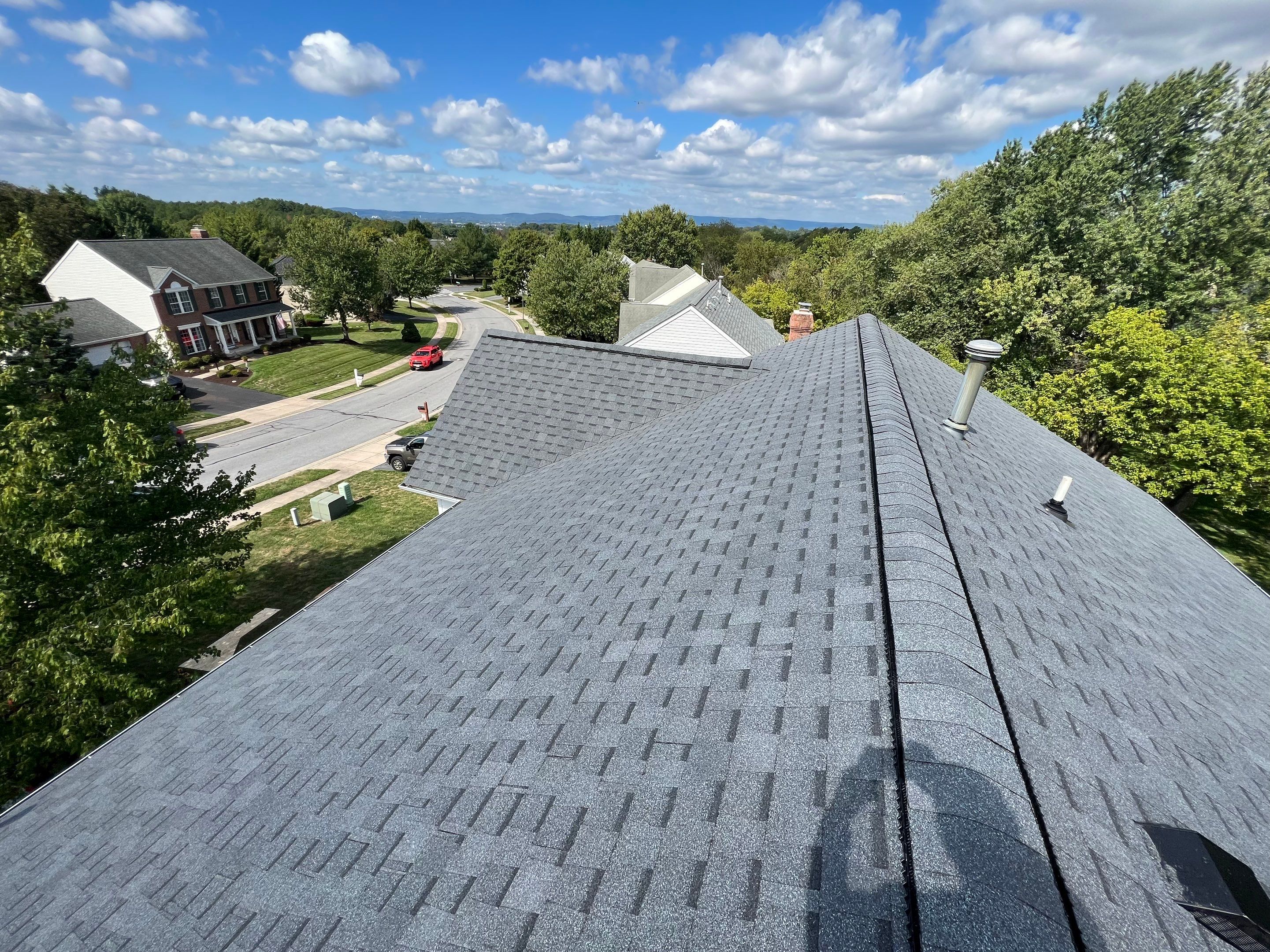 Residential Roofing Installation using Atlas Pinnacle Pristine Pewter Architectural Shingles by Frederick Roof Repair