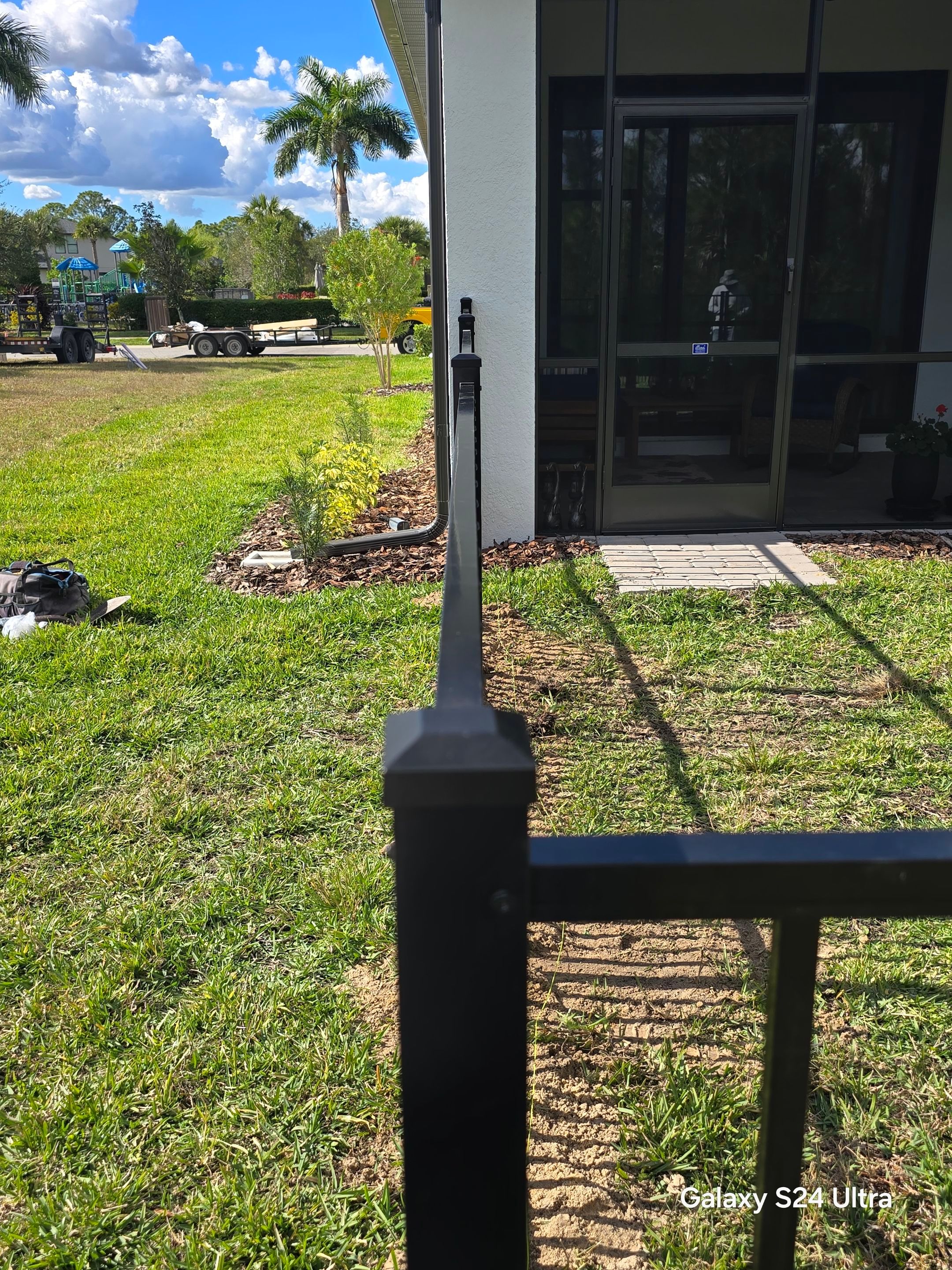 Puppy picket aluminum fence in North Port by True Fence LLC