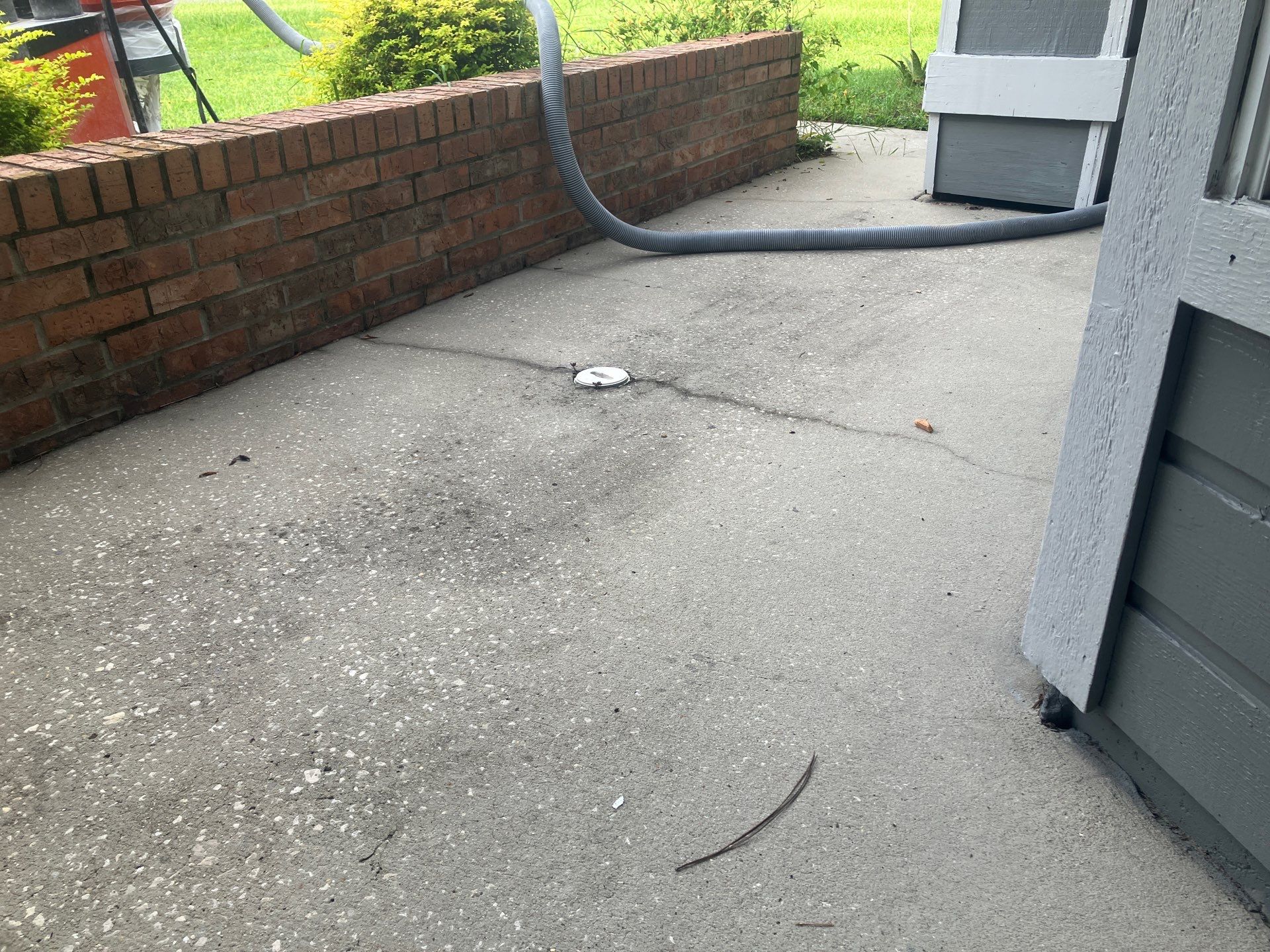 Front Entrance and Garage Makeover in Denim by Cross Creek Concrete Coatings