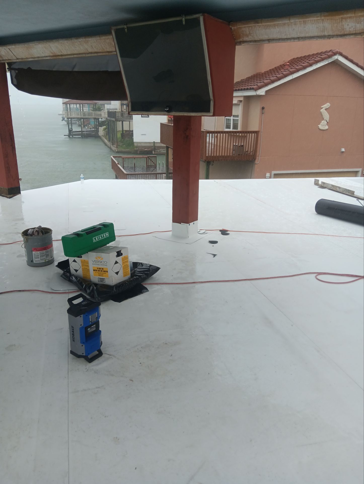 Walk Out Patio Cover by Bayfront Roofing and Construction