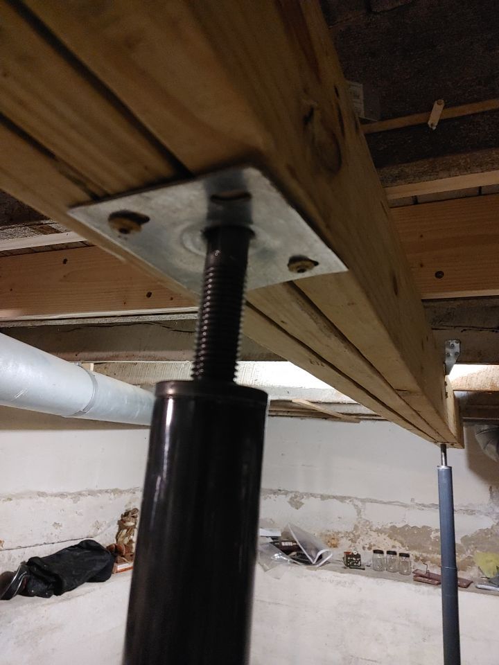 Structural Wood Reinforcement using Structural Wood and Steel Reinforcements (Main Floor Joist) by Toledo Basement Repair