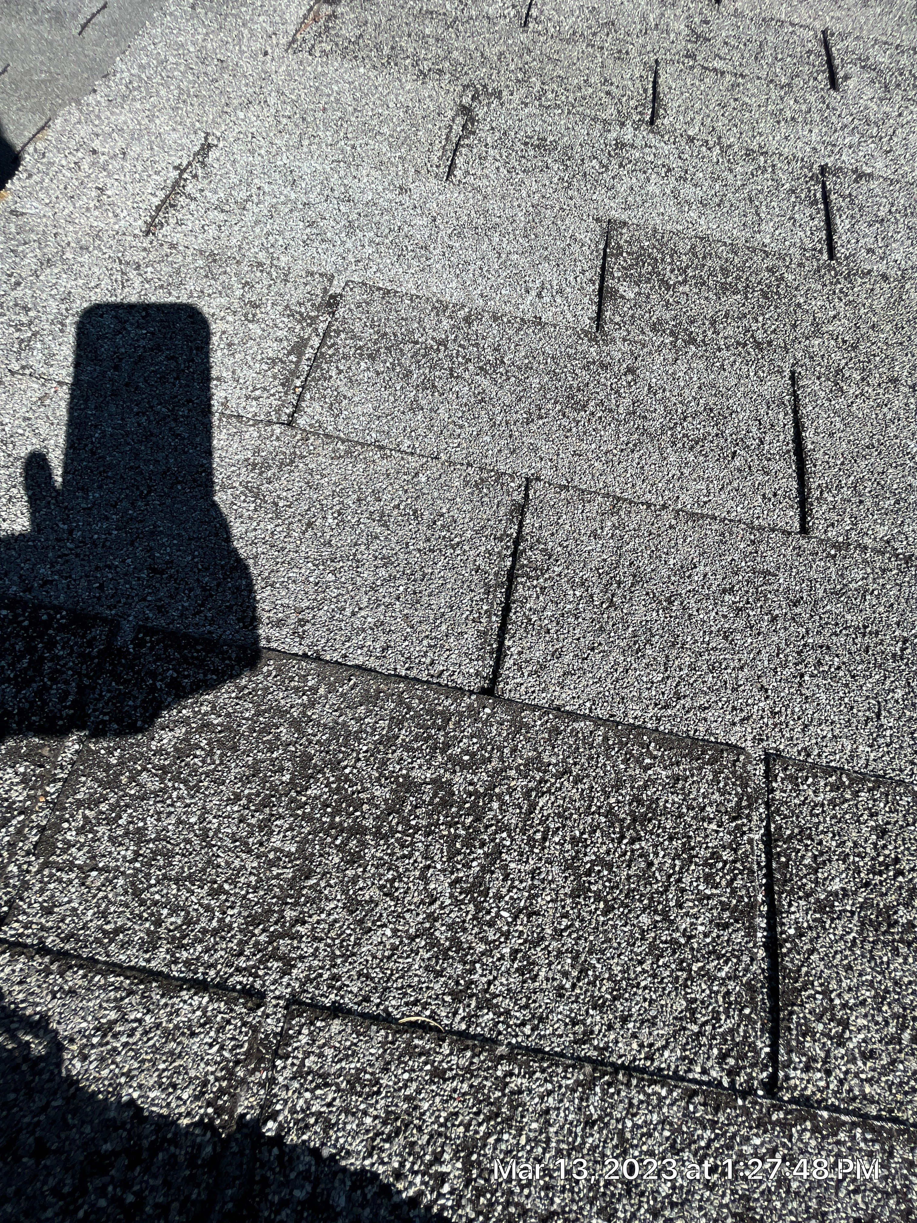 Residential Roofing Installation using 26 Gauge Colored Panels by Hostetler Roofing