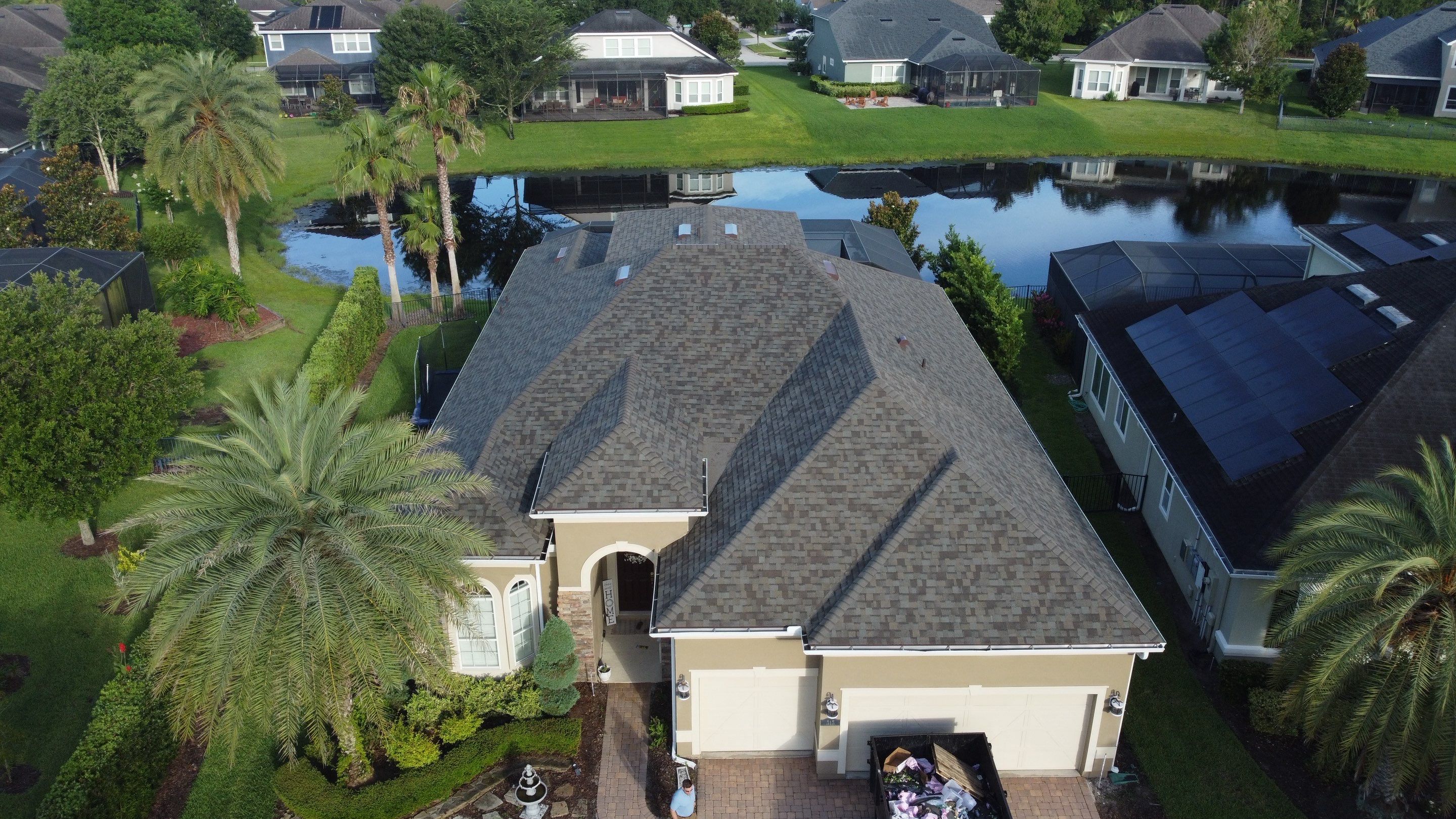 Ponte Vedra Residential Roof Replacement with Driftwood Architectural Asphalt Shingles by Trinity Restoration and Roofing LLC