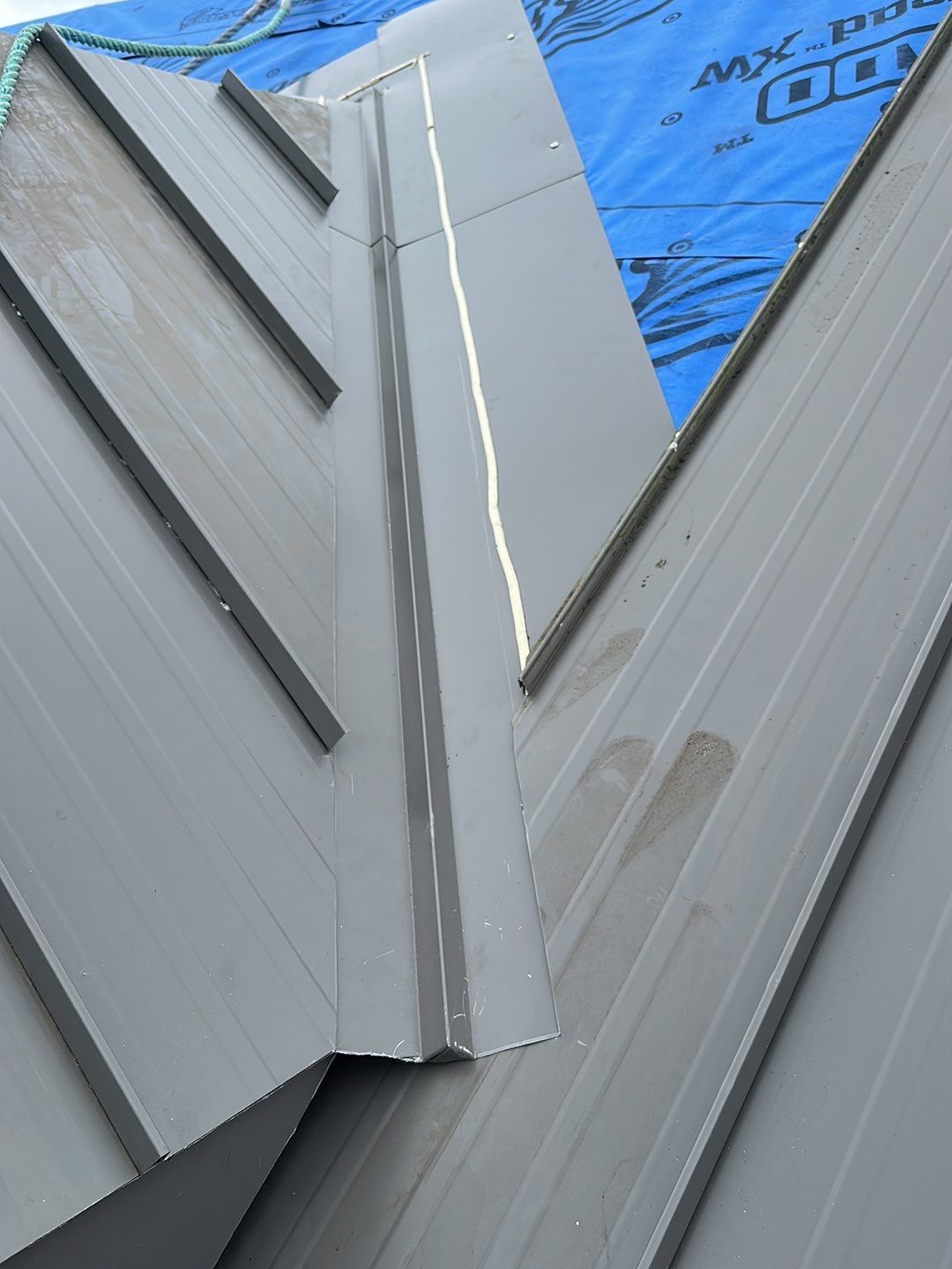 Agricultural Roofing Installation using 12" Prolok metal  by Top Notch Roofing Inc