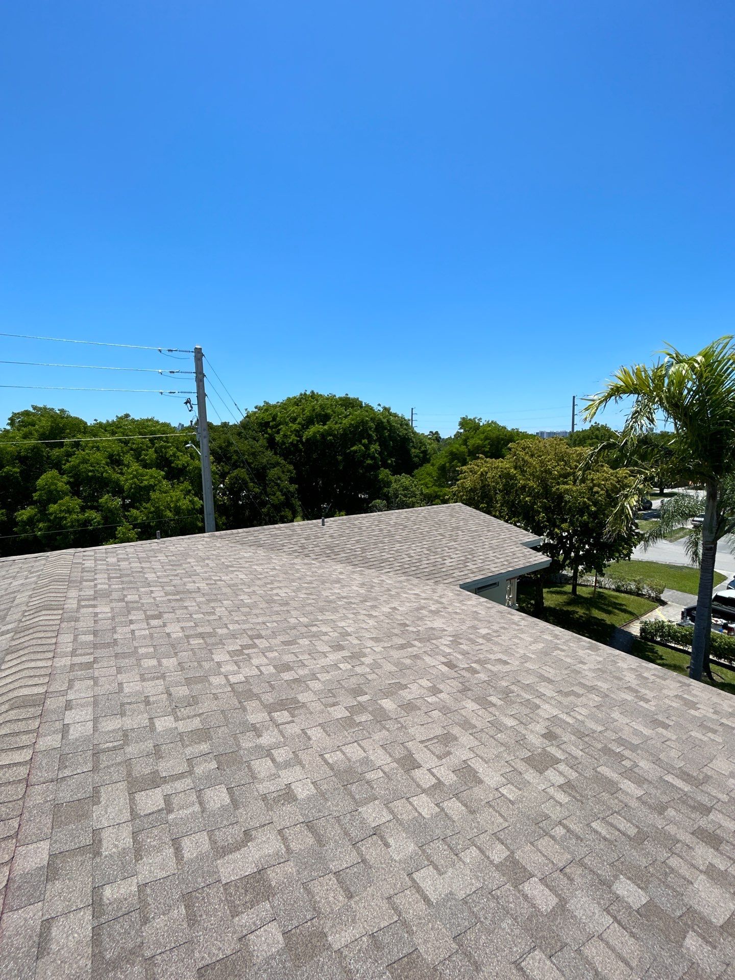 Commercial Roofing Installation using CERTAINTEED LANDMARK AR (SUNRISE CEDAR) by Earl W. Johnston Roofing 