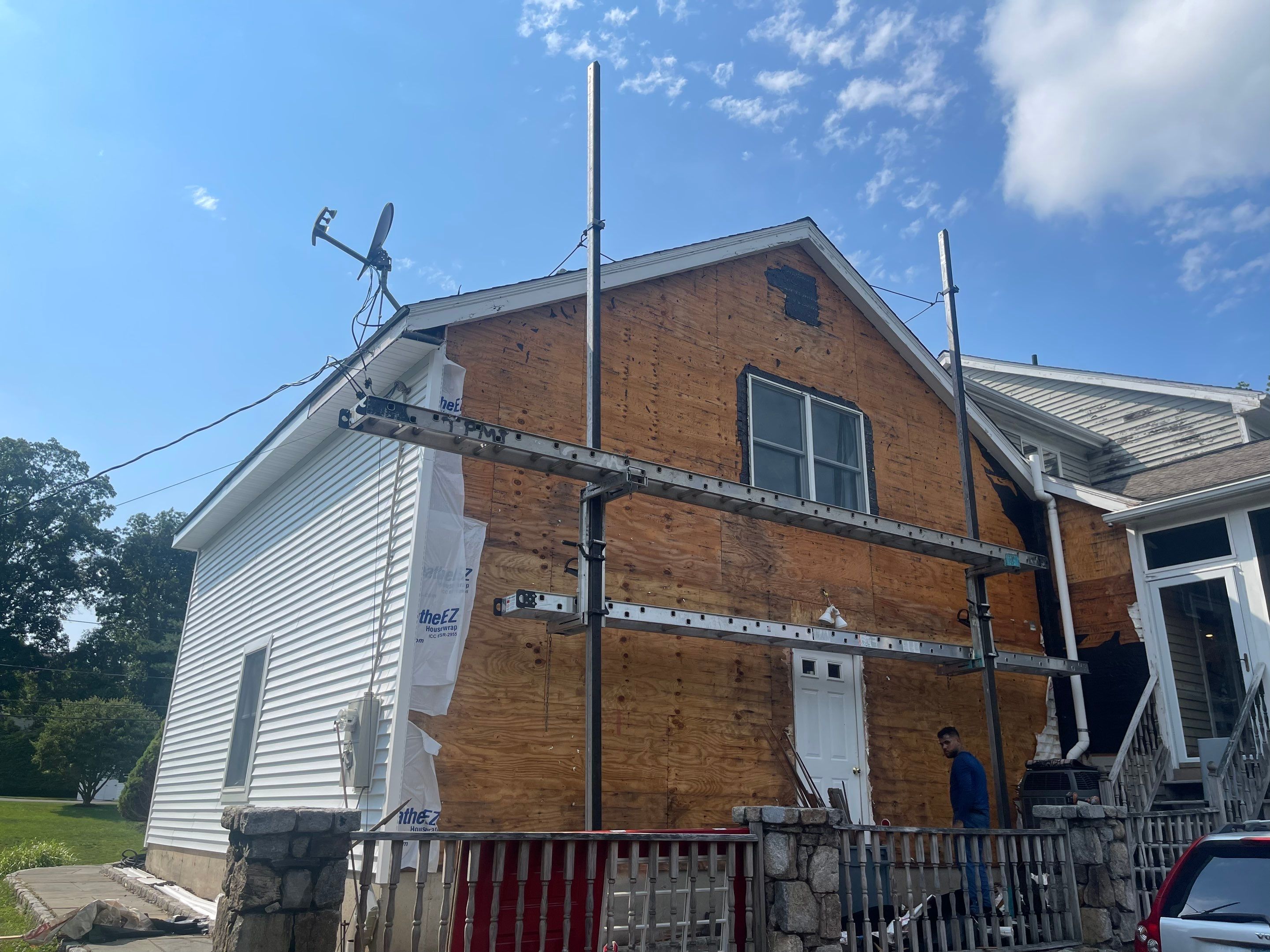 Siding Installation using Mainstreet Colonial & White gutters by A Plus Exterior