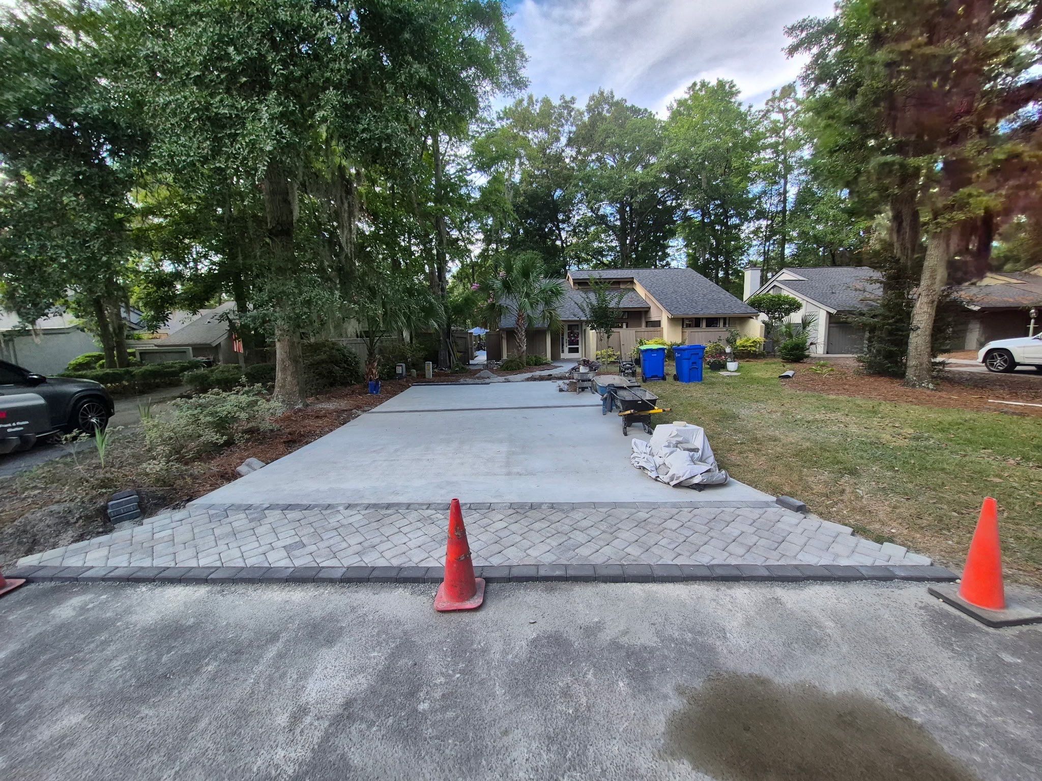 Custom Concrete Patio and Herringbone Paver Walkway in Hilton Head Island by Lowcountry Scapes, LLC