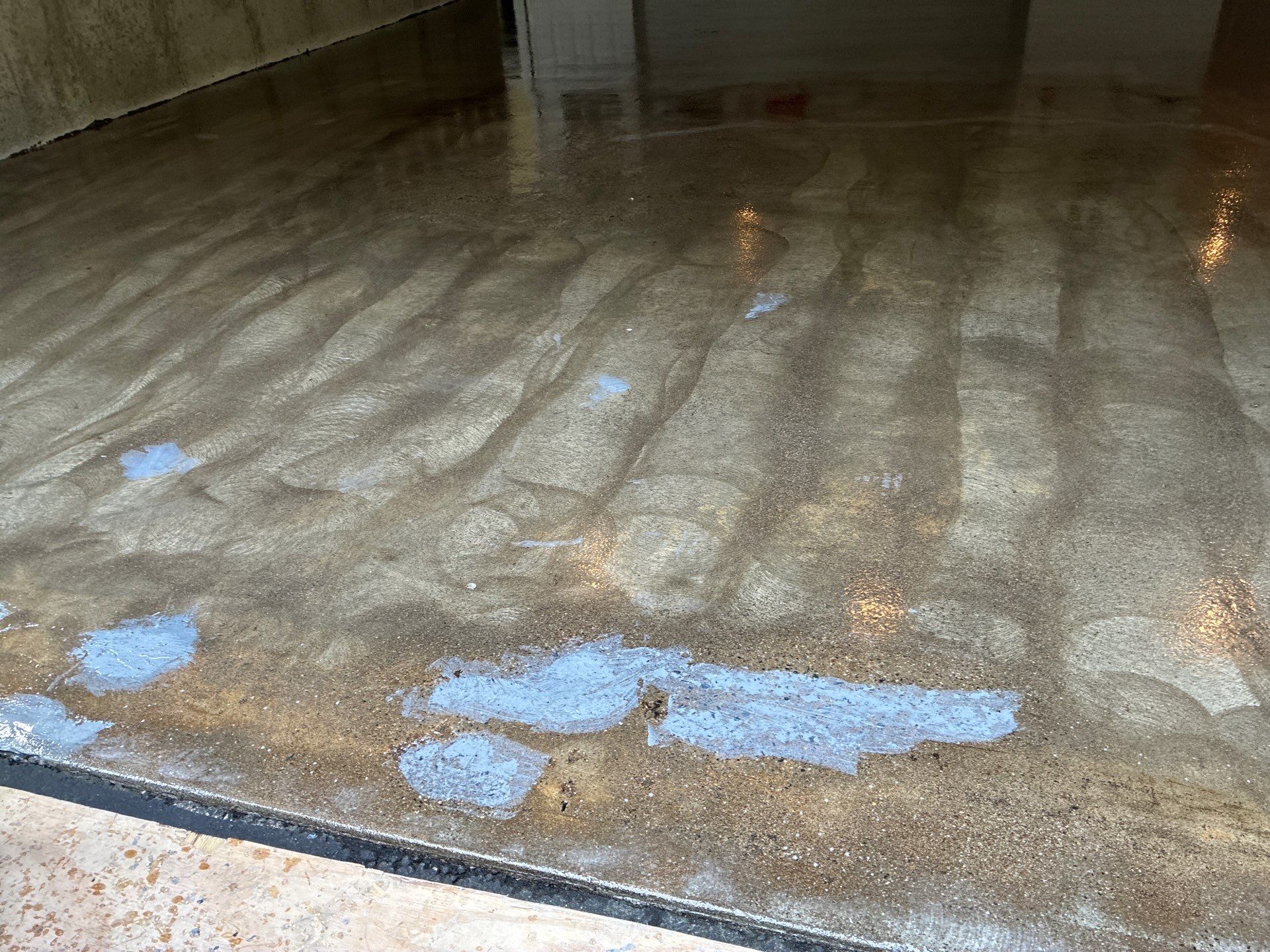 Tidal Wave Concrete Floor Coating Transformation by DiGiorgi Roofing and Siding Inc