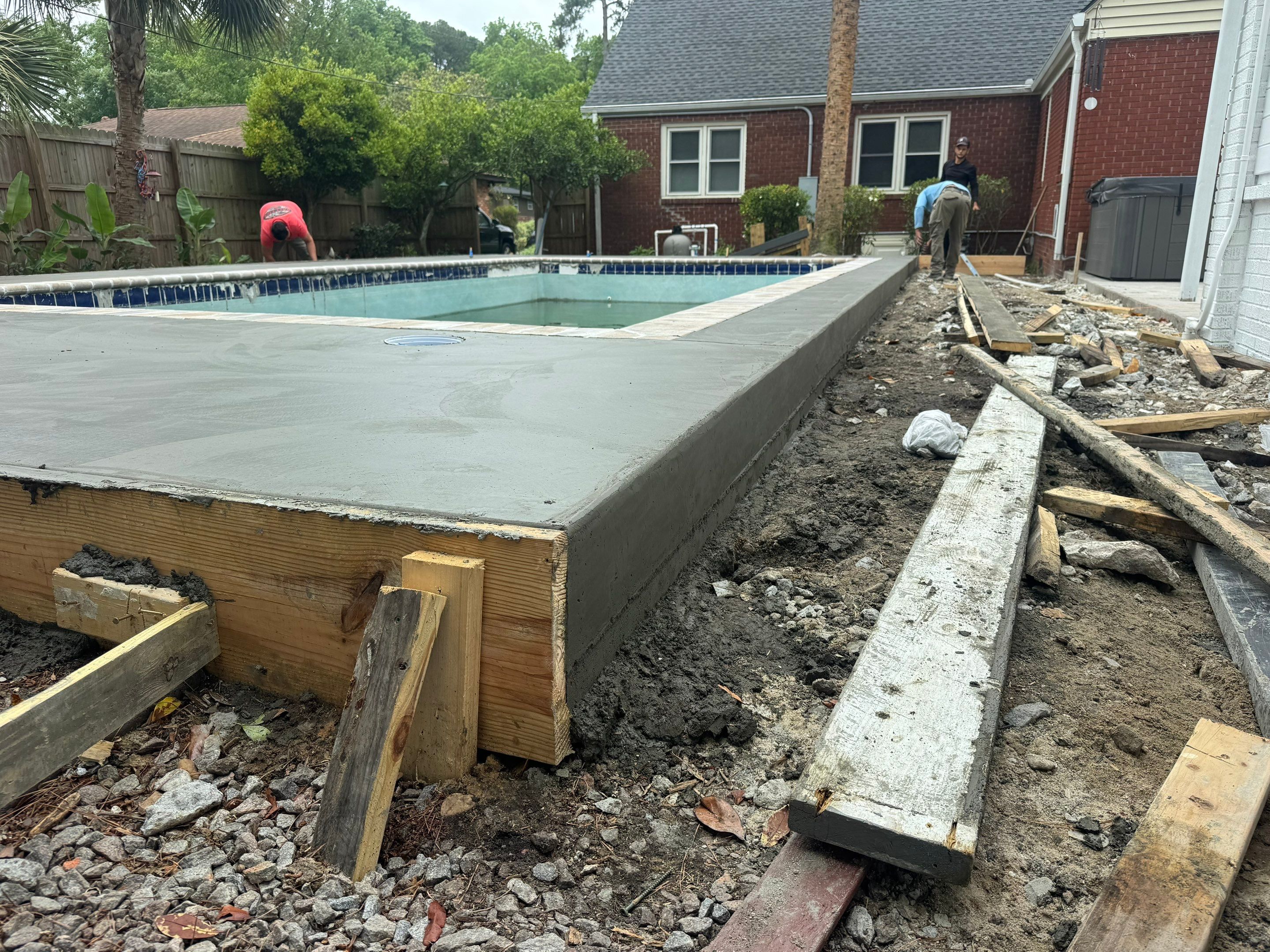 Savannah Pool Deck Replacement with Textured Concrete and Brick Coping by Lowcountry Scapes, LLC
