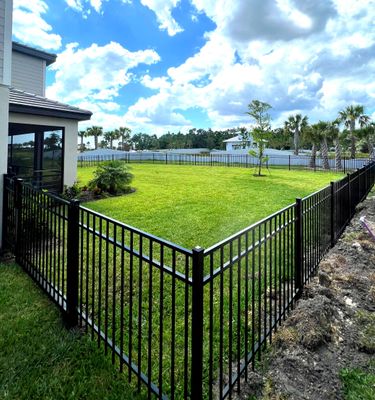 Aluminum Fence Installation using Black 3 Rail Aluminum Fence
