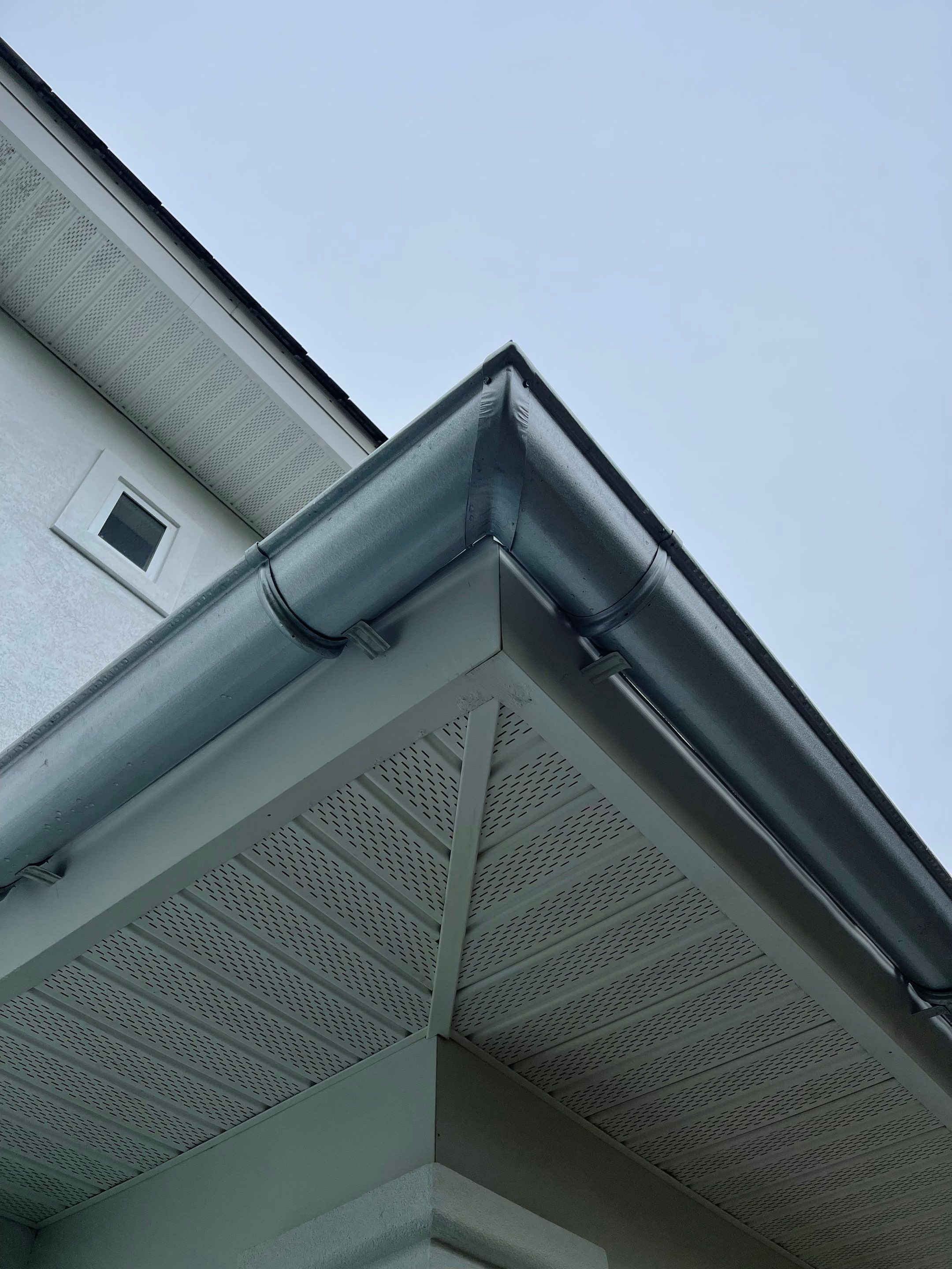 Seamless Gutter Installation using Half Round Galvanized Gutters by Gutter Professors