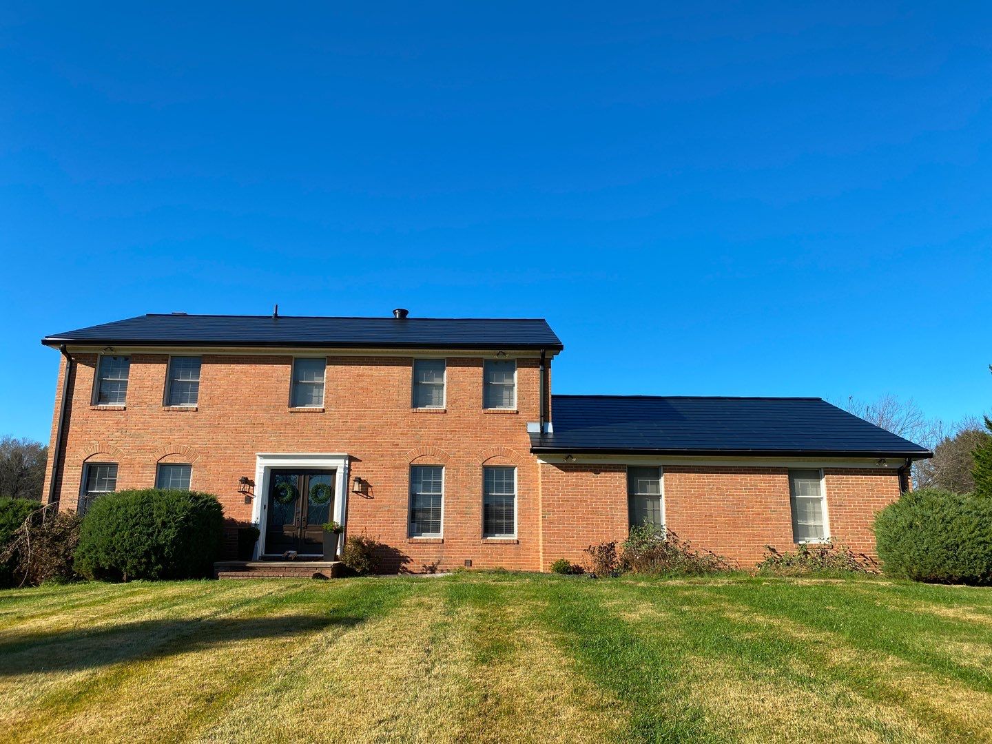 Tesla Solar Roof by American Home Contractors