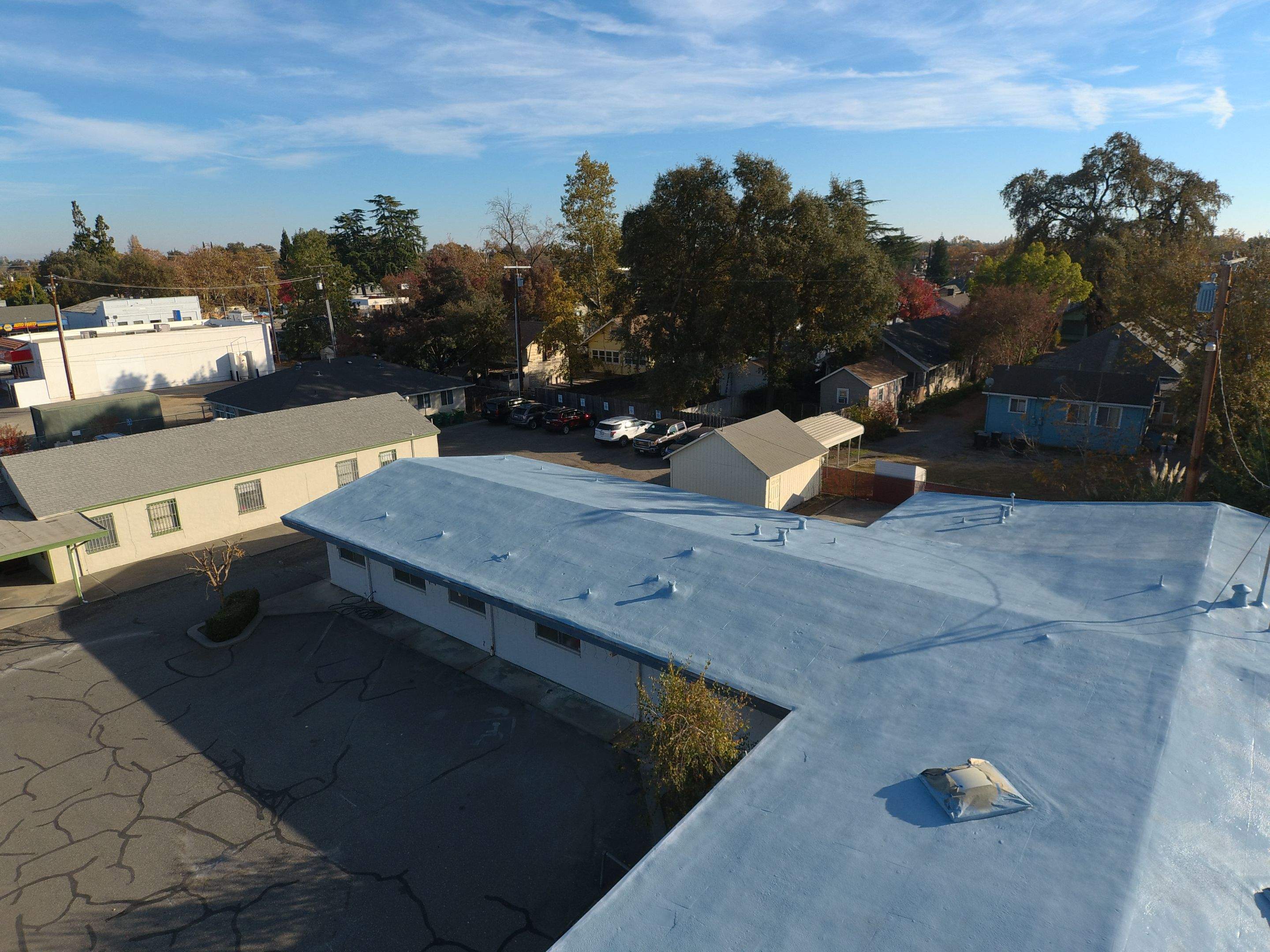 Spray foam and coatings using Conklin Benchmark/PUMA XL coatings and spray foam by Straight Edge Roofing Inc