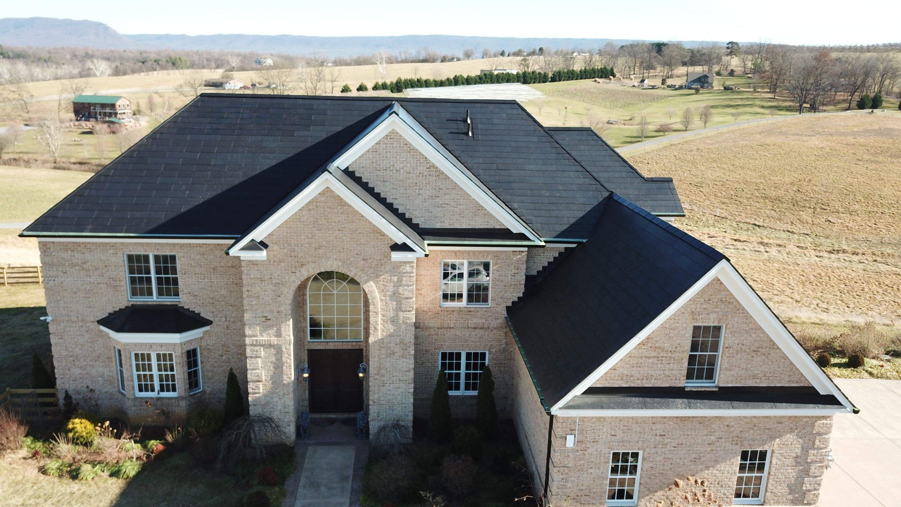 Tesla Solar Roof Replacement by American Home Contractors