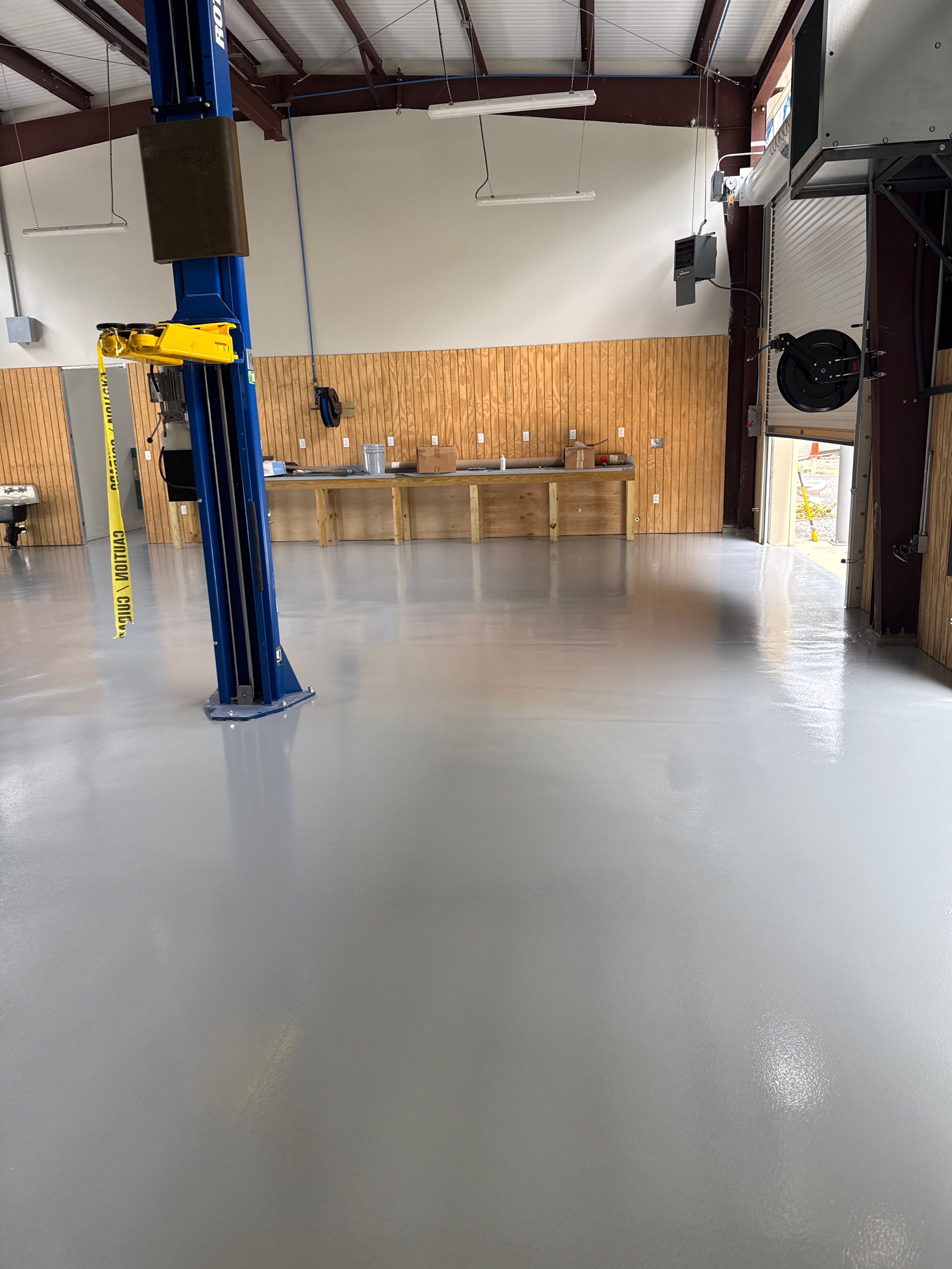 Industrial Epoxy Flooring for Sandhill Crane Workshop in Gautier by Cornerstone Hard Surface Restoration 